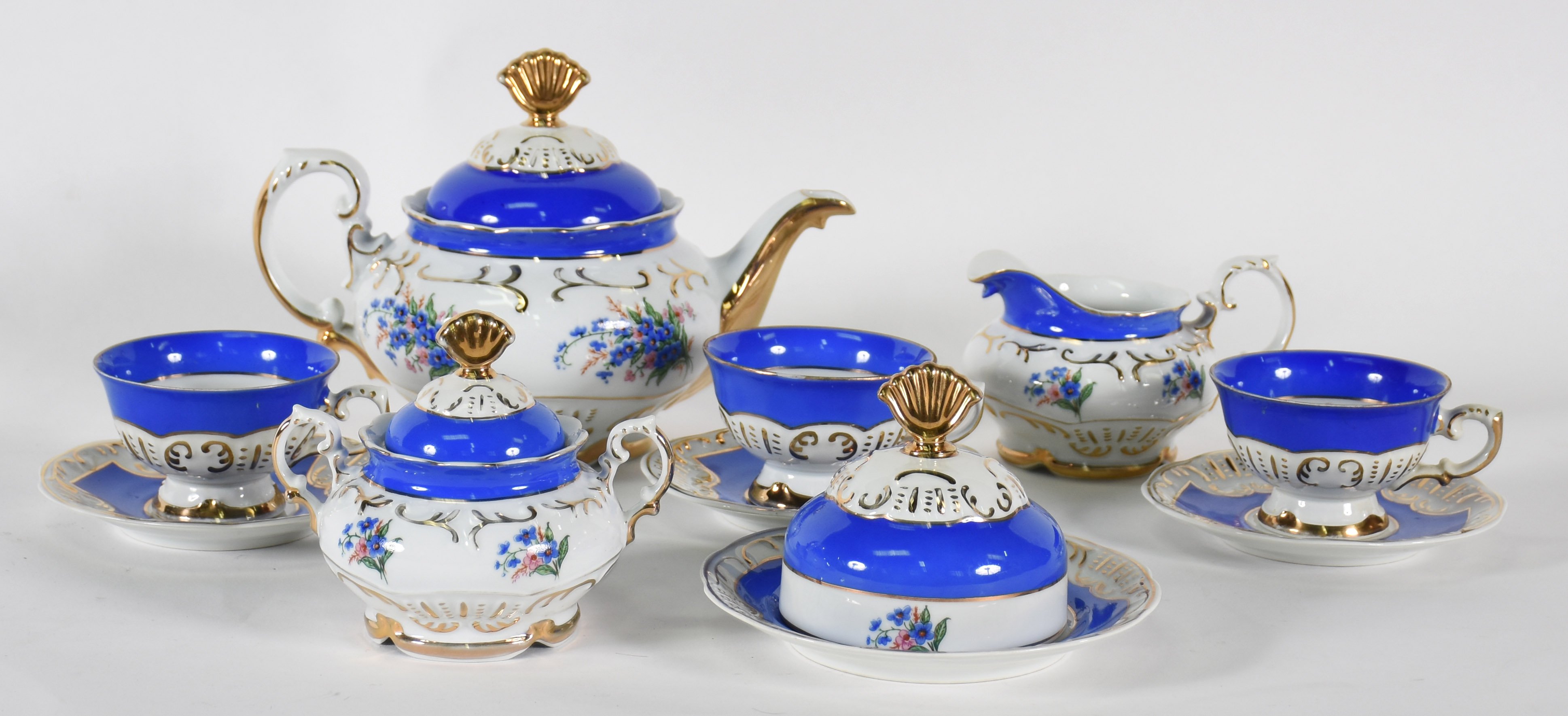 Aparelho de chá de porcelana Schmidt, ricamente decorado com faixas... - foto 1 de 5