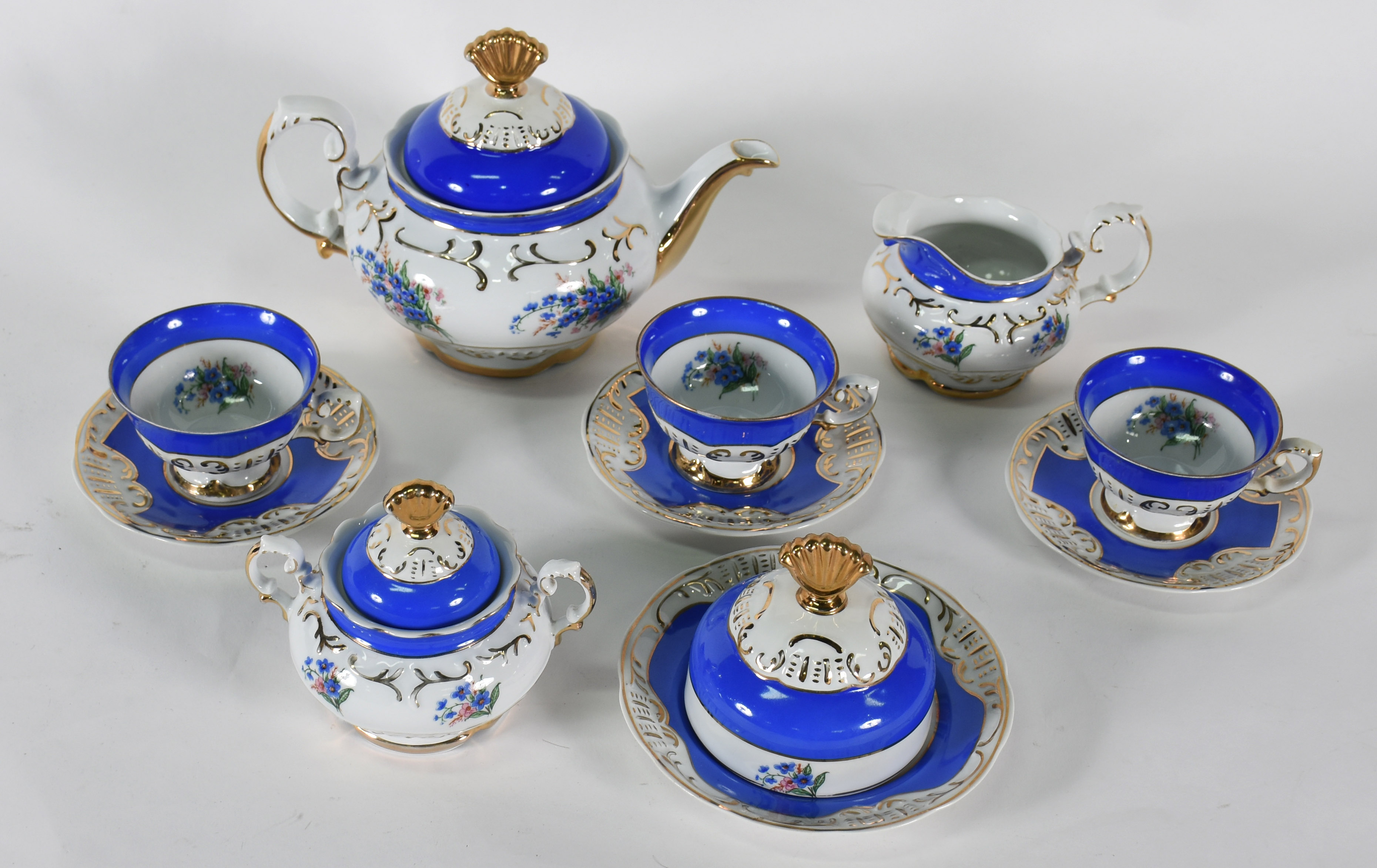Aparelho de chá de porcelana Schmidt, ricamente decorado com faixas... - foto 2 de 5