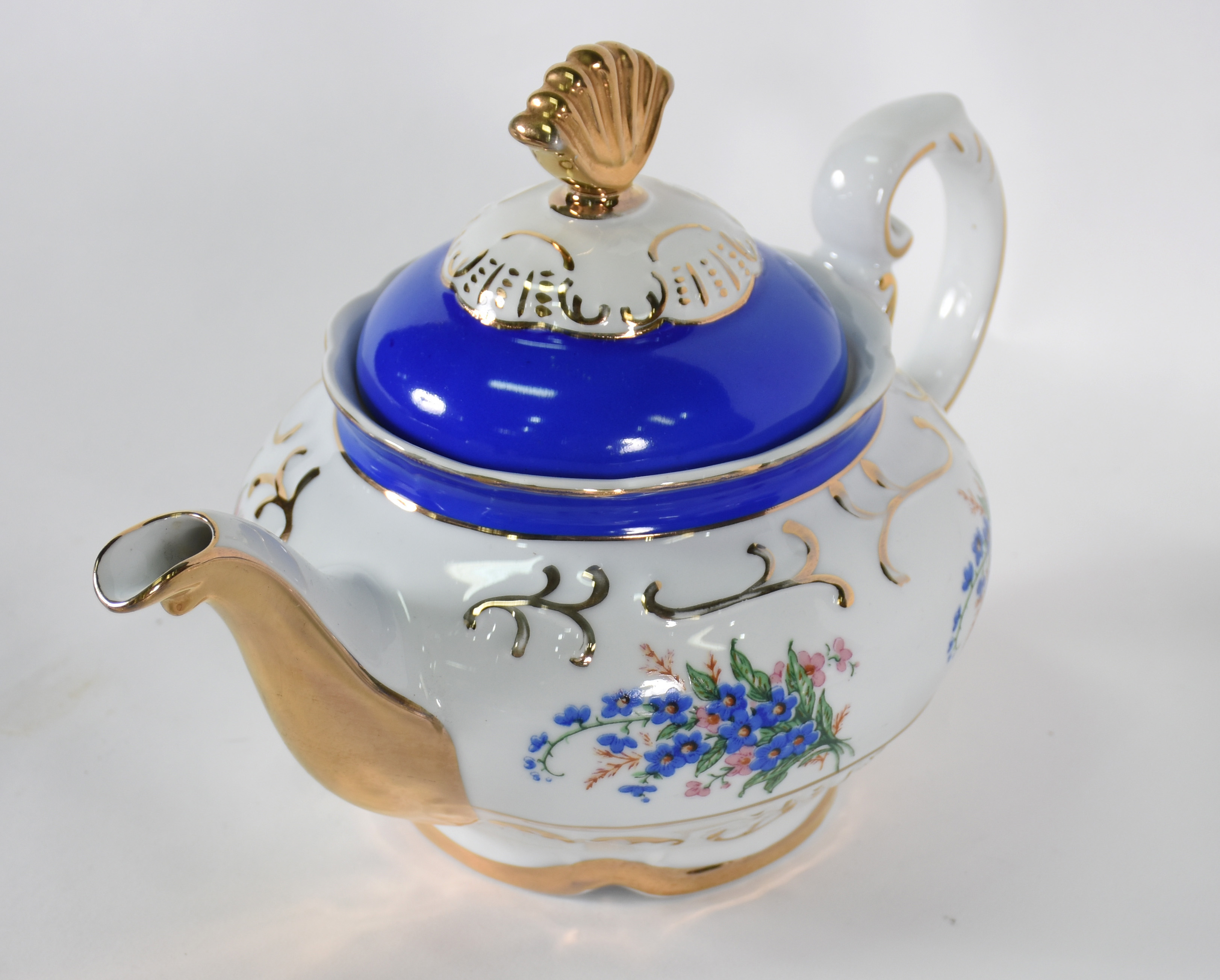 Aparelho de chá de porcelana Schmidt, ricamente decorado com faixas... - foto 4 de 5