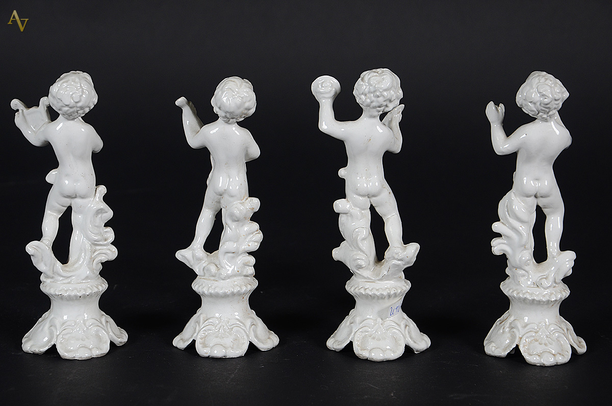 Quatro esculturas de porcelana representando anjos das quatro... - foto 2 de 3
