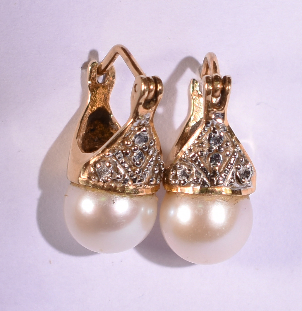 Par de brincos de ouro de ouro 18k com pérolas ( Por questão de... - foto 2 de 2