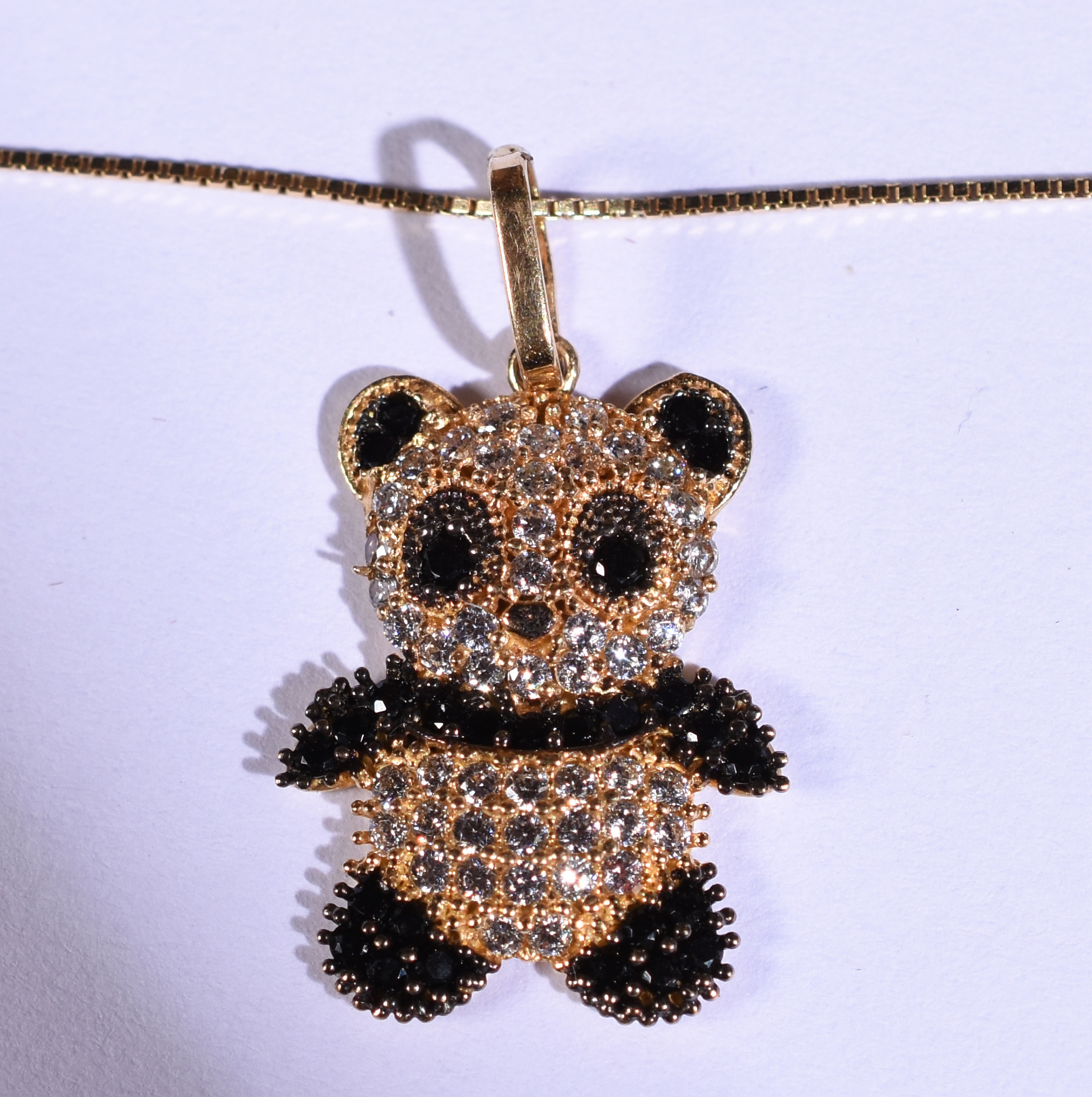 Colar de ouro 18k e pingente "urso panda" com safiras ( Por questão... - foto 1 de 4