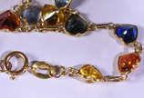 Pulseira de ouro 18k com pedras coloridas (por ... - Pulseira de ouro 18k com pedras coloridas (por questão de segurança a peça não se encontra na loja )