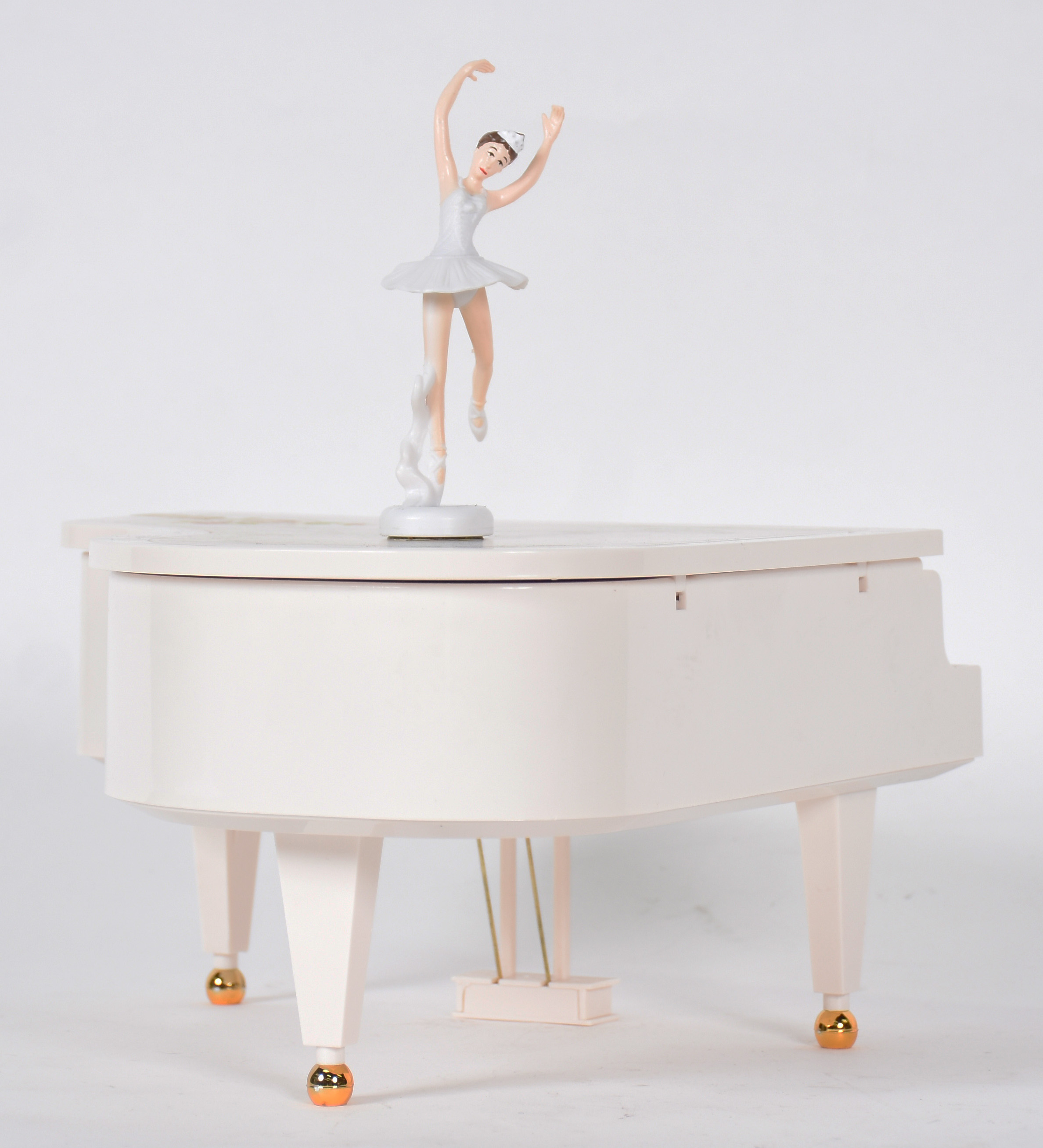 Caixa de música de material sintético representando piano com... - foto 4 de 7