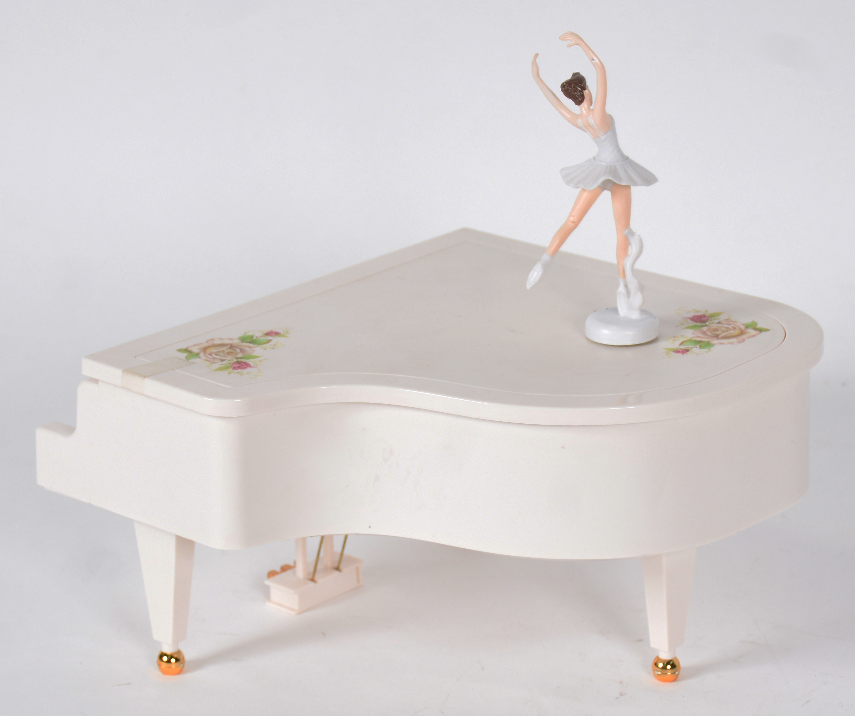 Caixa de música de material sintético representando piano com... - foto 7 de 7