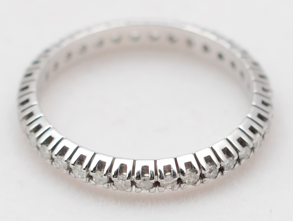 Aliança completa de ouro branco com aproximadamente 0.70 ct de...