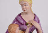 Teresa Linhares,  - Grupo escultório representando mulher com crianças.Esta estatueta foi elaborada com a mais pura porcelana de Limoges - França .
Os escultores  envolvi