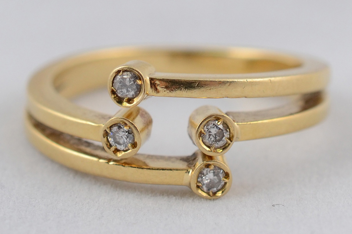 Anel de ouro amarelo 18 k modelo dois aros com quatro pequenos... - foto 1 de 2