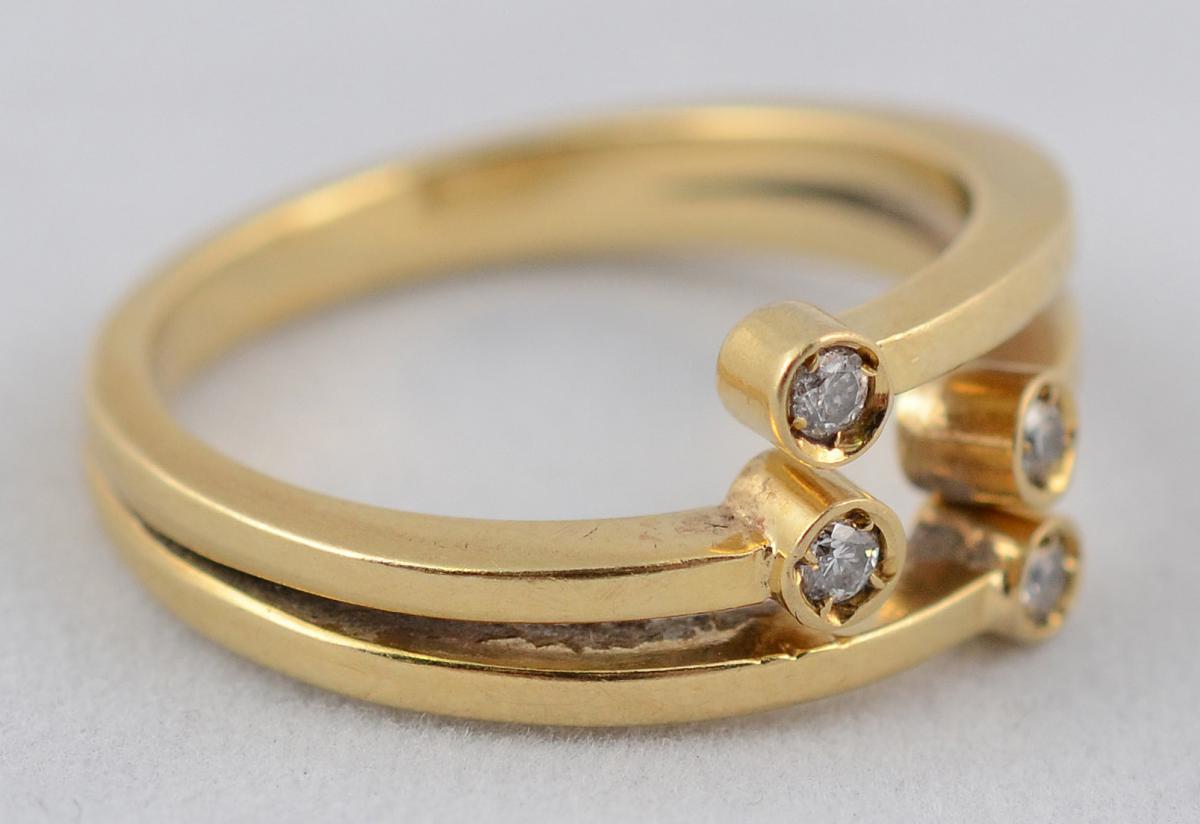 Anel de ouro amarelo 18 k modelo dois aros com quatro pequenos... - foto 2 de 2