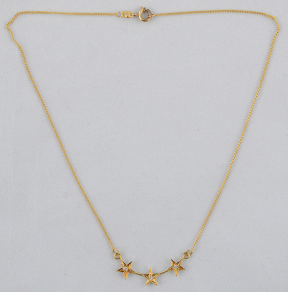 Colar de ouro amarelo 18 k com pendentes em forma de três estrelas... - foto 2 de 2