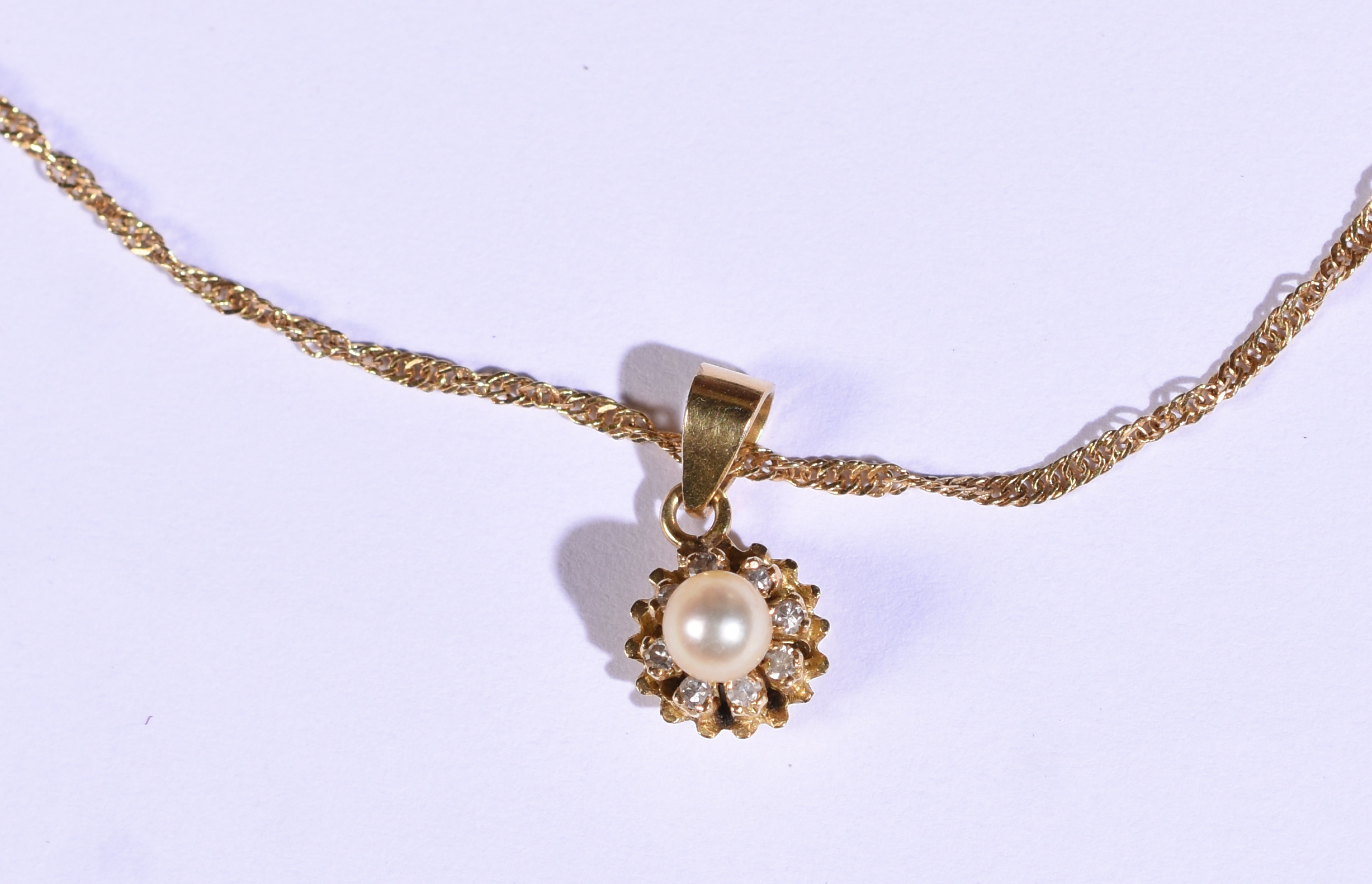 Colar de ouro 18k e pingente com pérolas e safiras (Por questão de... - foto 1 de 4