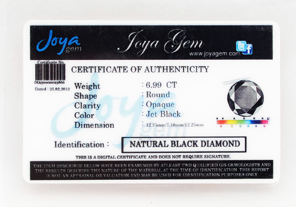 Brilhante negro natural, de 6.99 ct, montado em ouro branco 18 k... - foto 3 de 3