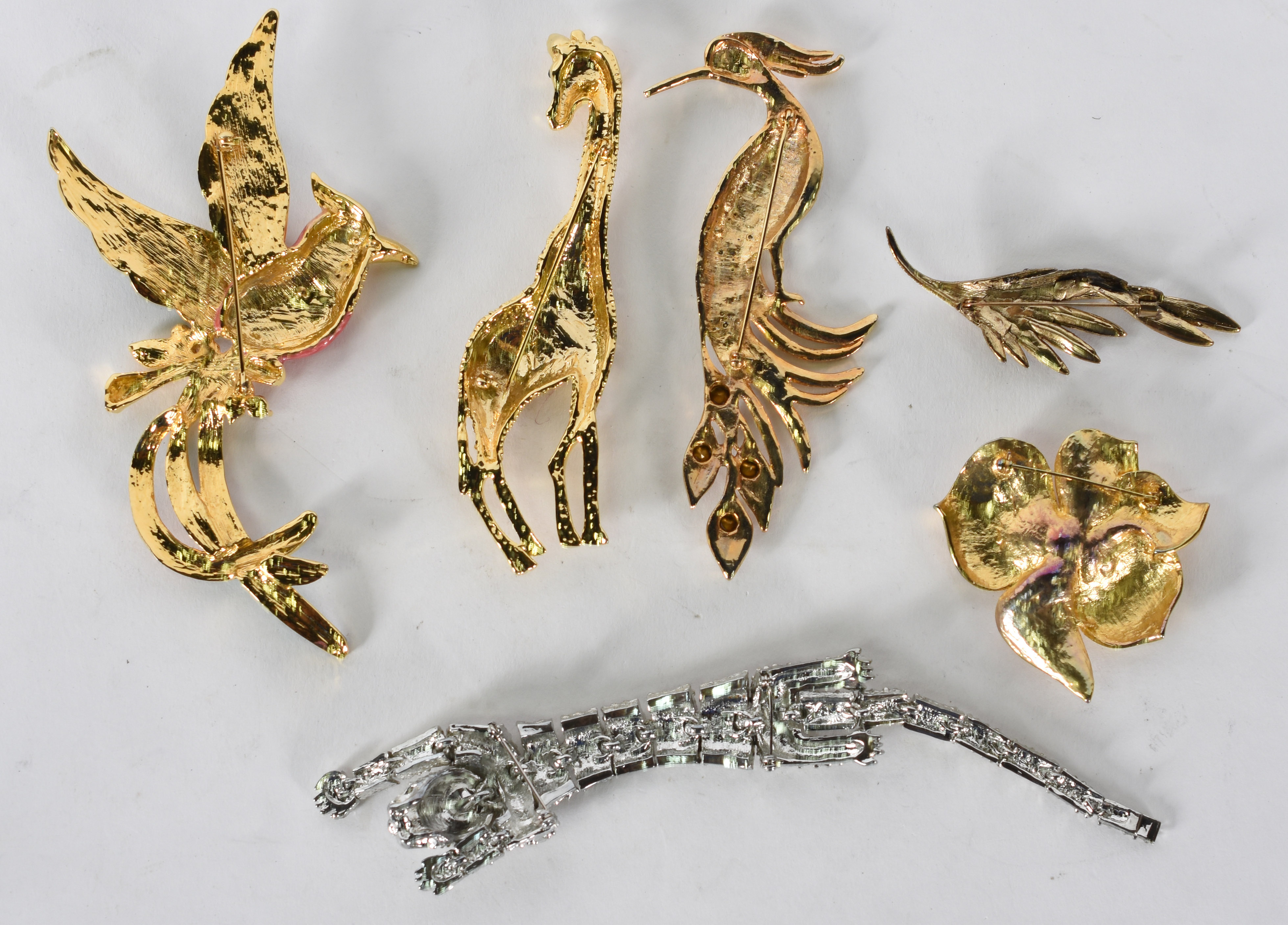 Seis broches bijouterias diversos de metal e strass . - foto 3 de 4