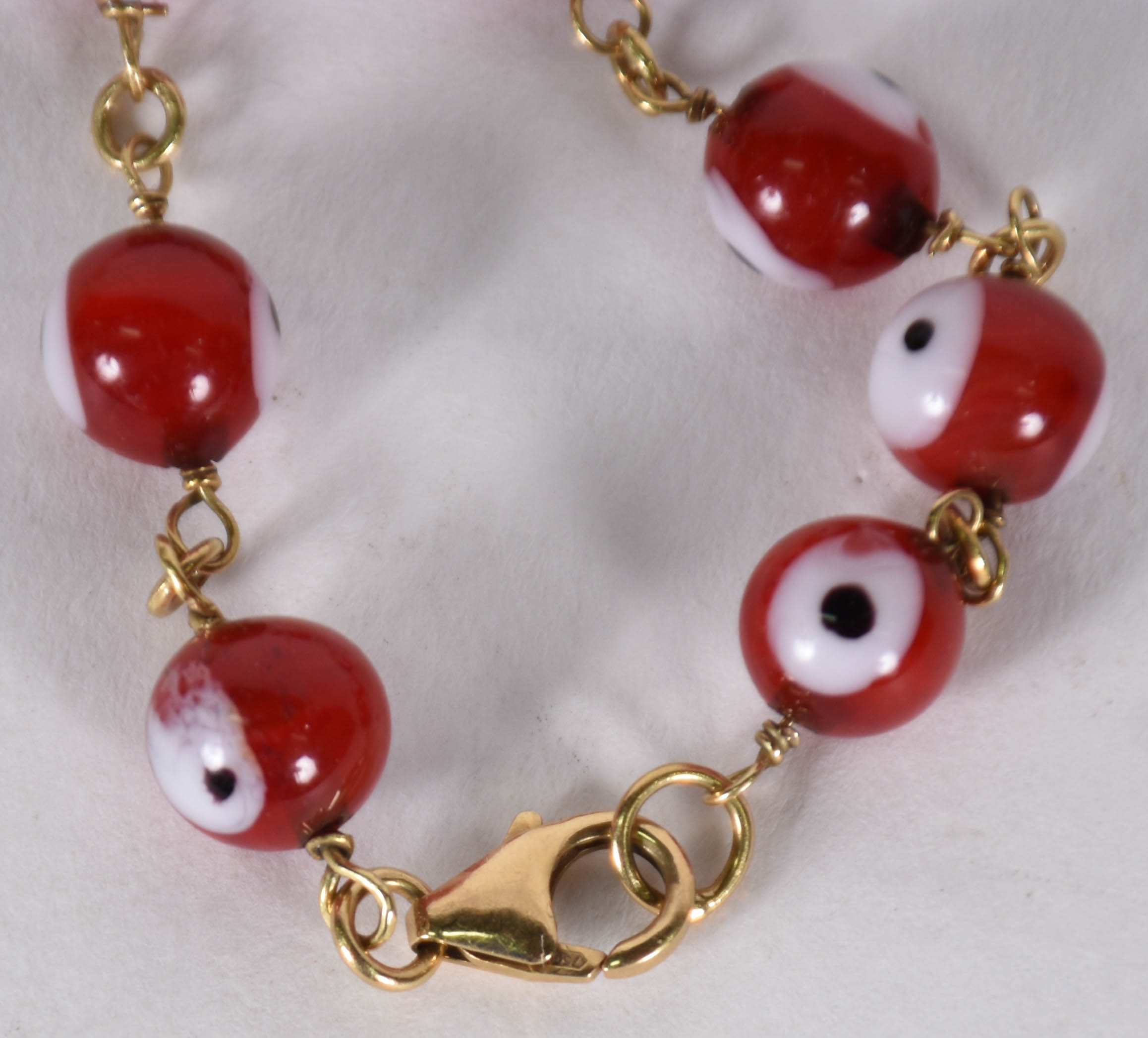 Pulseira com ouro e "olho grande"(por questão de segurança a peça não... - foto 2 de 2