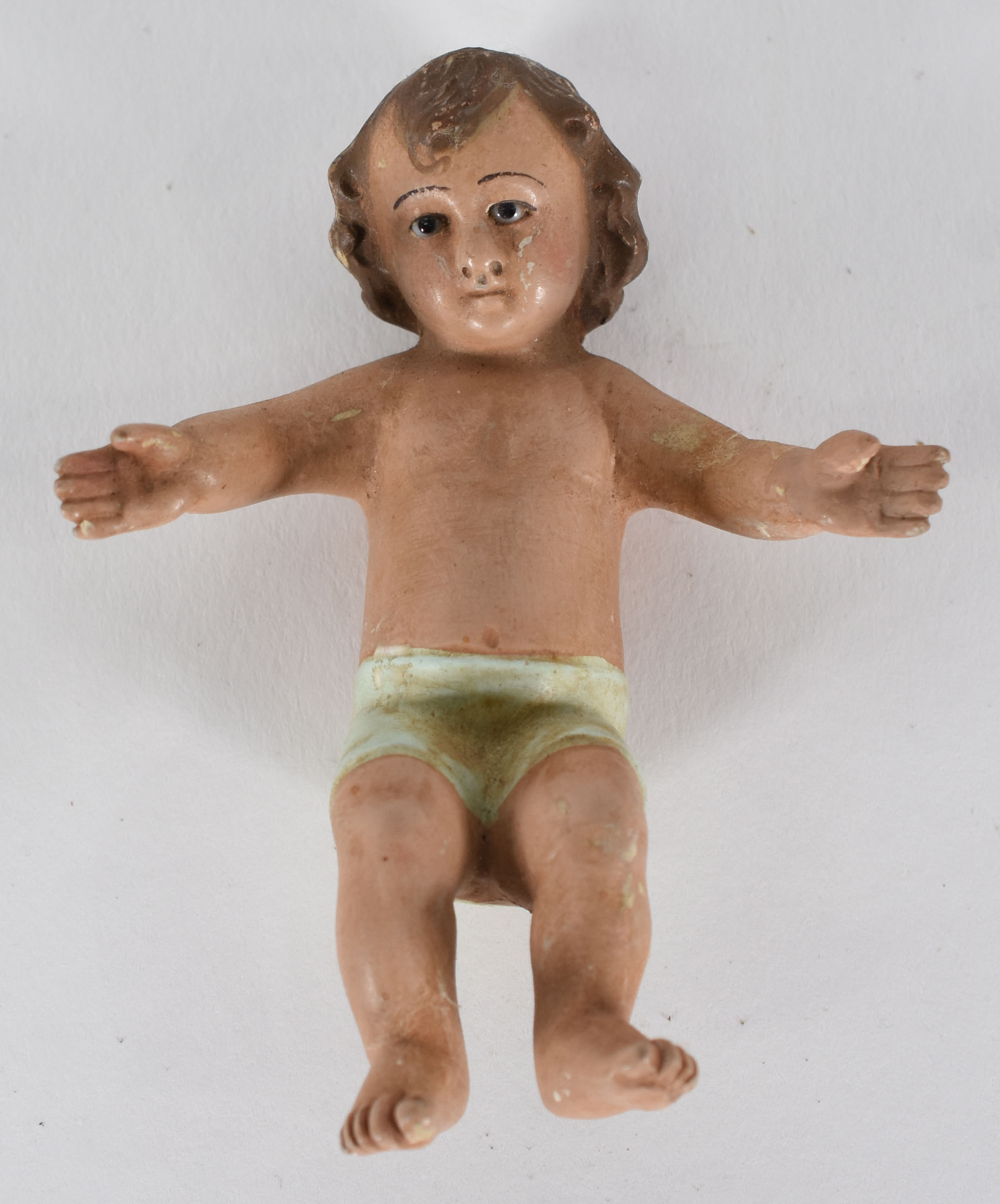 Pequeno menino Deus de madeira policromada e olhos de vidro. - foto 1 de 3