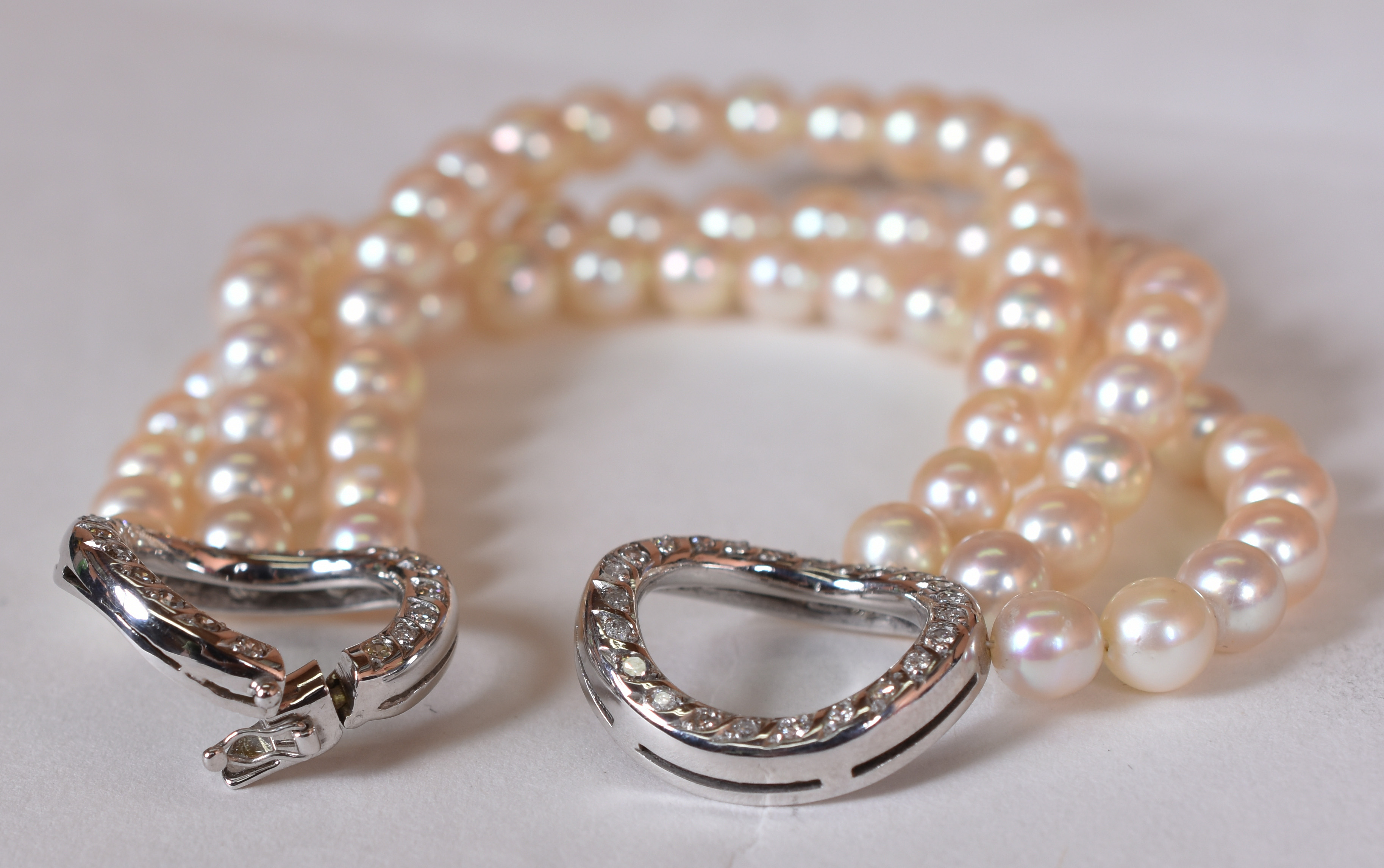 Conjunto de Colar e pulseira com fios triplos de pérolas brancas... - foto 5 de 7