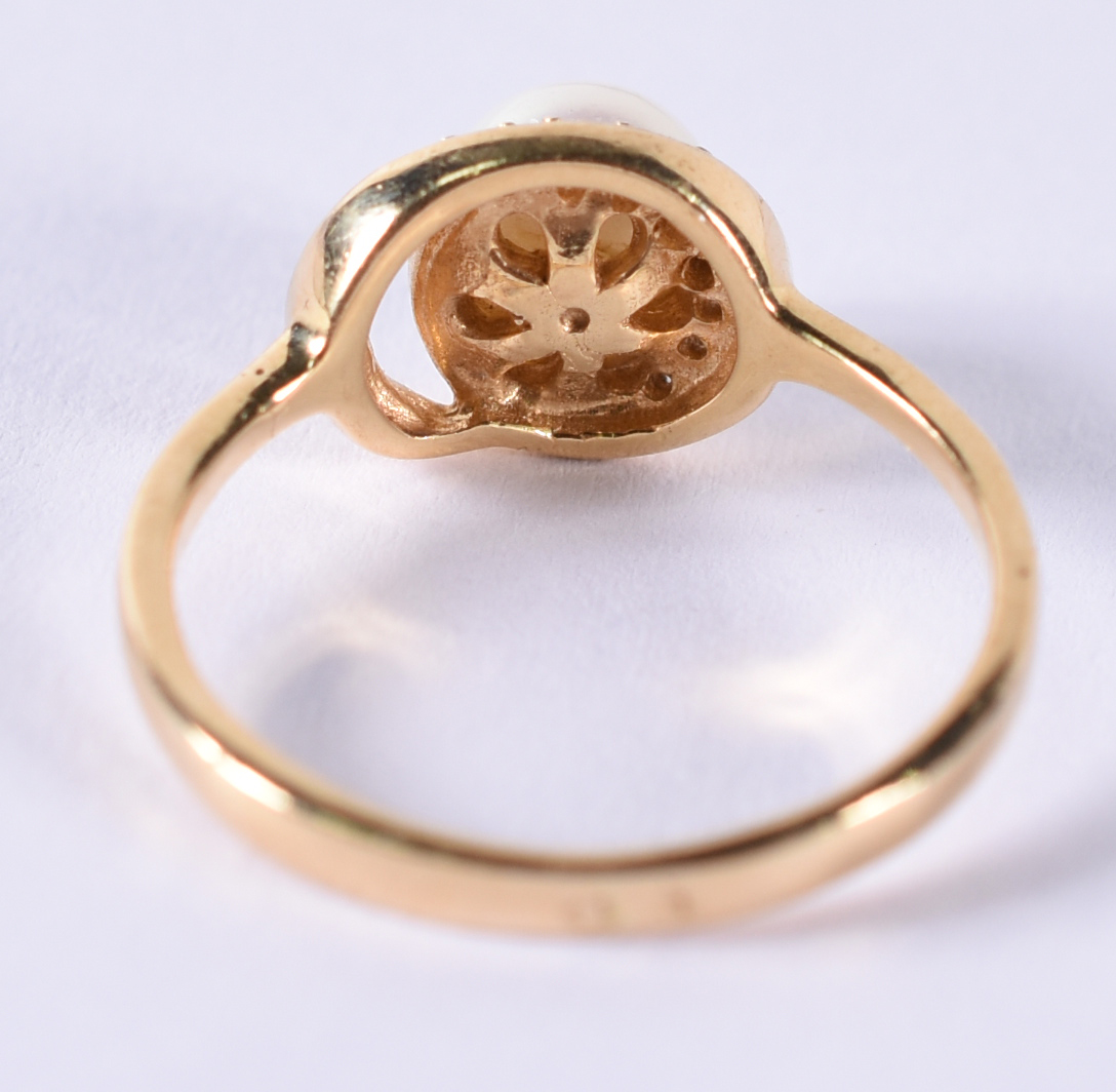 Anel de ouro 18 k com safiras e pérola cultivada .Aro 17 (por questão... - foto 3 de 4