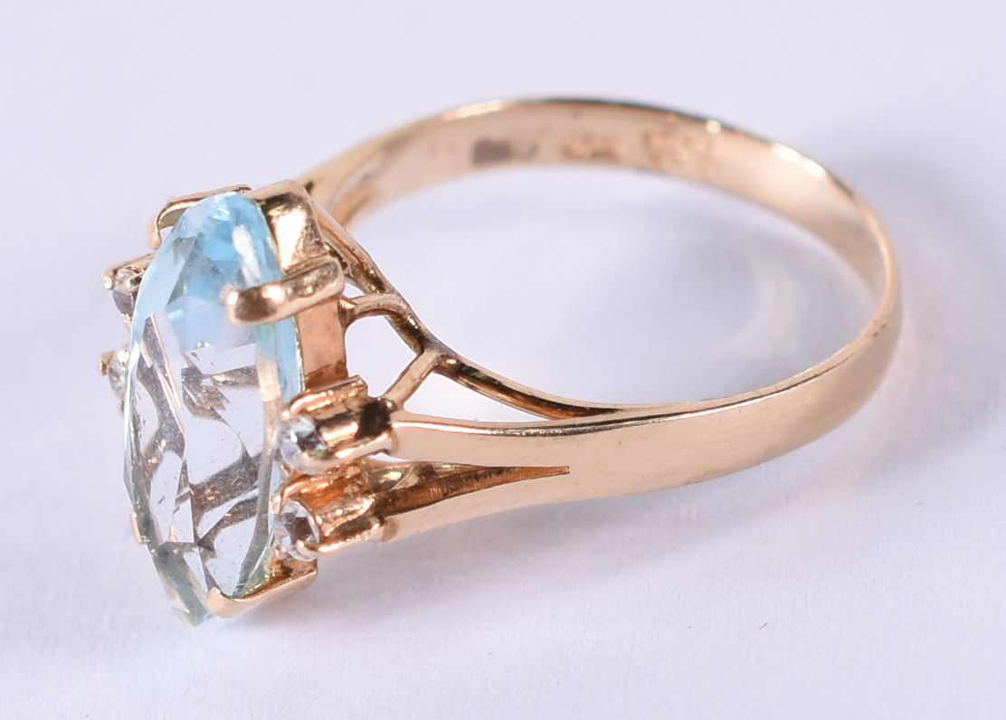 Anel de ouro 14 k com 4 brilhantes e topázio azul .Aro 15. (por... - foto 2 de 4