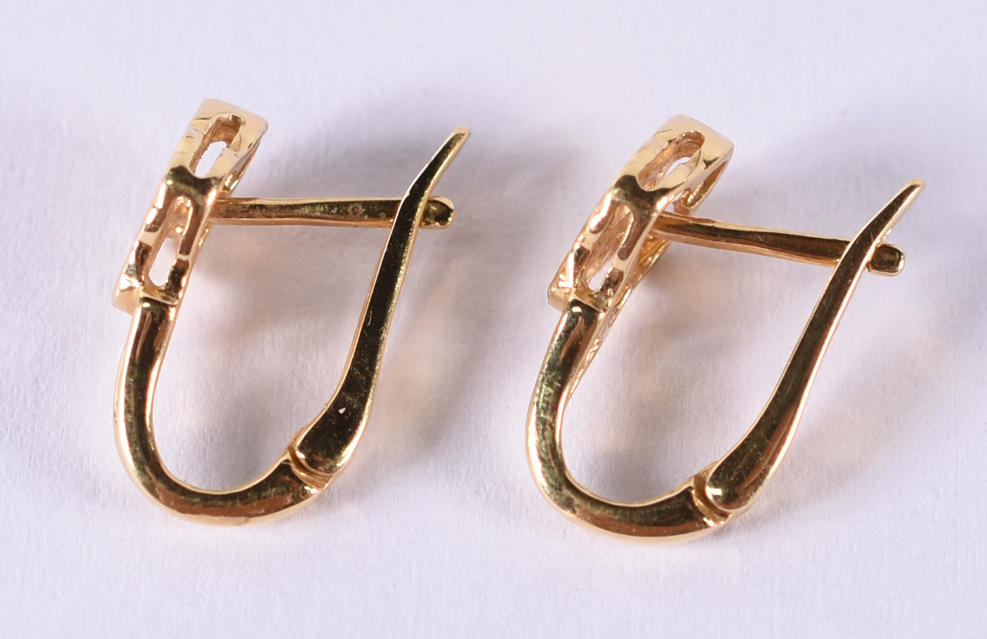 Par de brincos de ouro 18 k com 10 brilhantes . total 0,50 ct. Aro... - foto 3 de 3