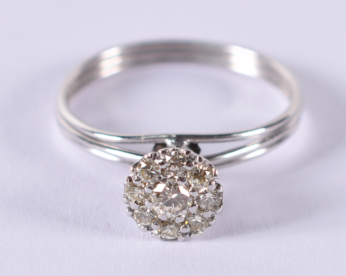 Anel de ouro branco 18 k tipo chuveiro com 10 brilhantes de... - foto 1 de 3