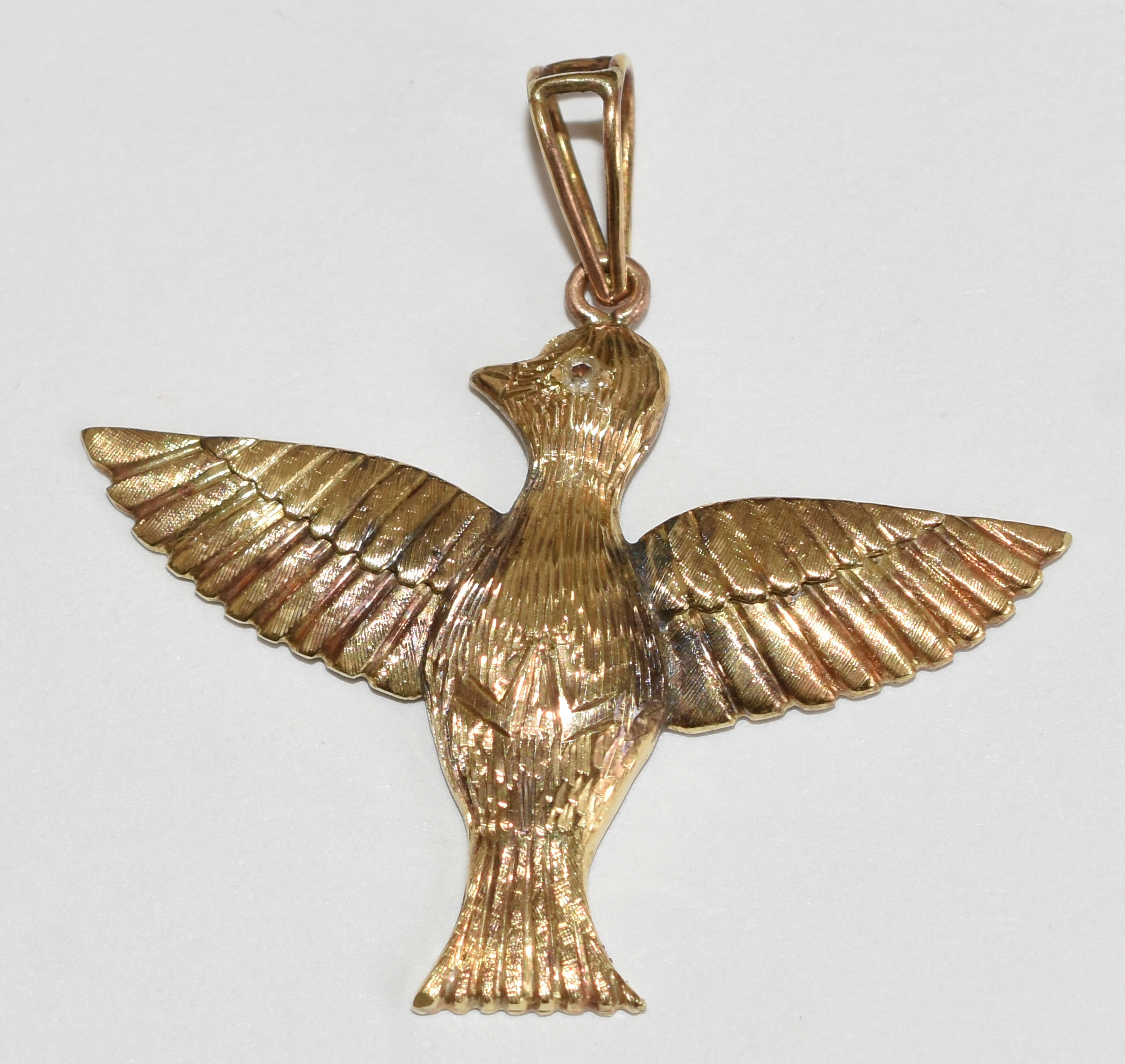 Pingente de ouro 18 k representando "Pomba - Espírito Santo". (Por... - foto 1 de 3