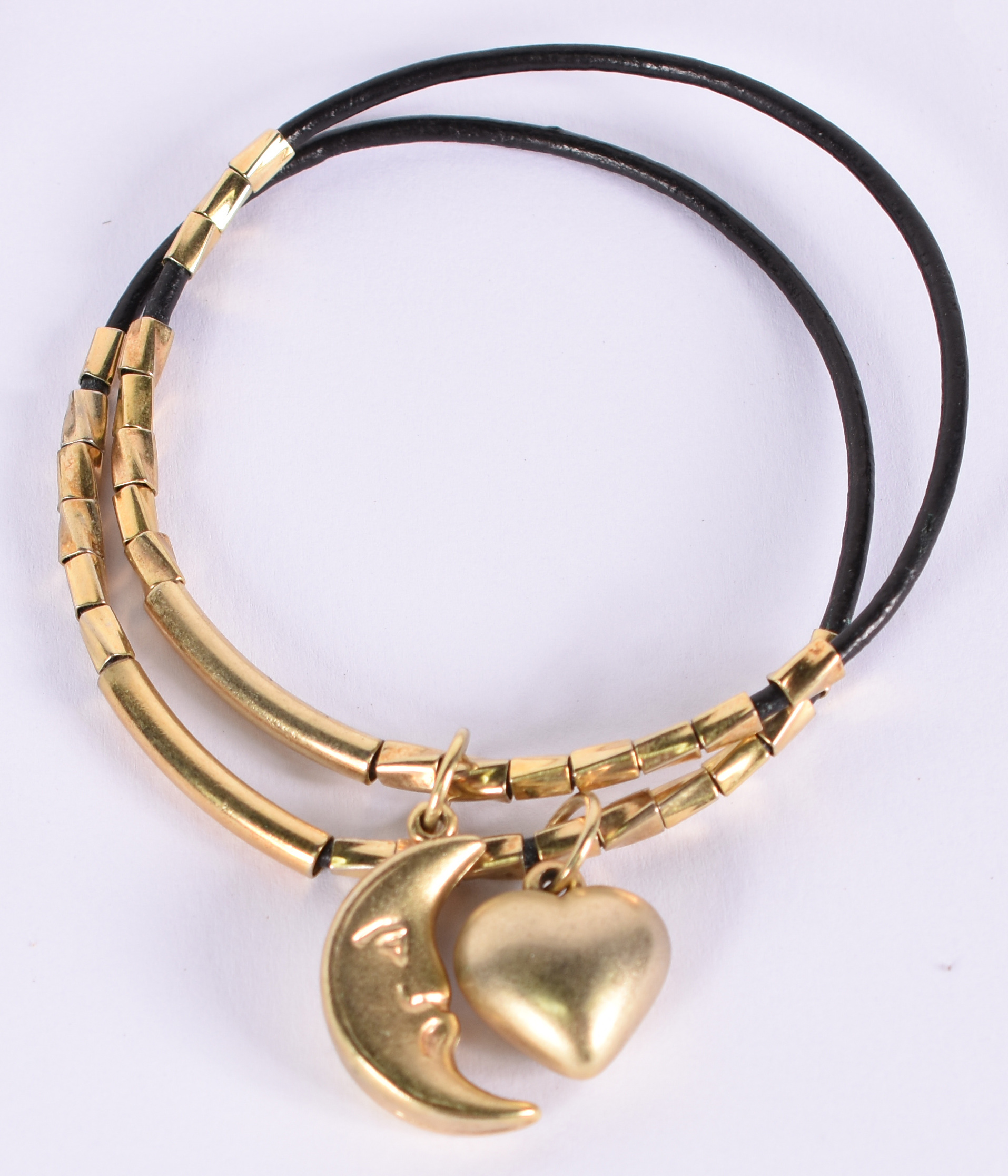Nove pulseiras de rabo de elefante com metal dourado (Por questão de... - foto 2 de 6