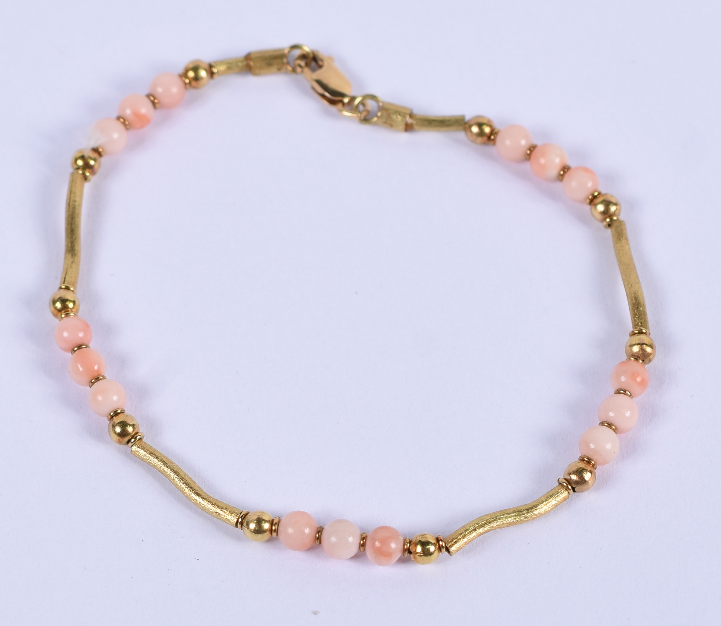 Pulseira de ouro 18 k e coral.(Por questão de segurança a peça não se... - foto 1 de 3