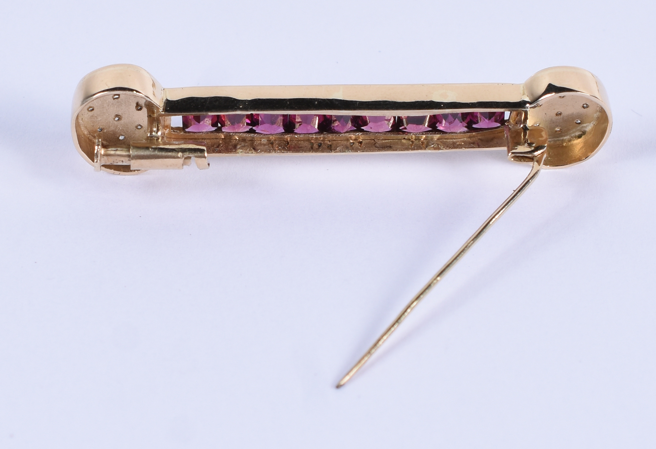 Barrete de ouro 18k com brilhante e turmalina rosa.(Por questão de... - foto 3 de 3