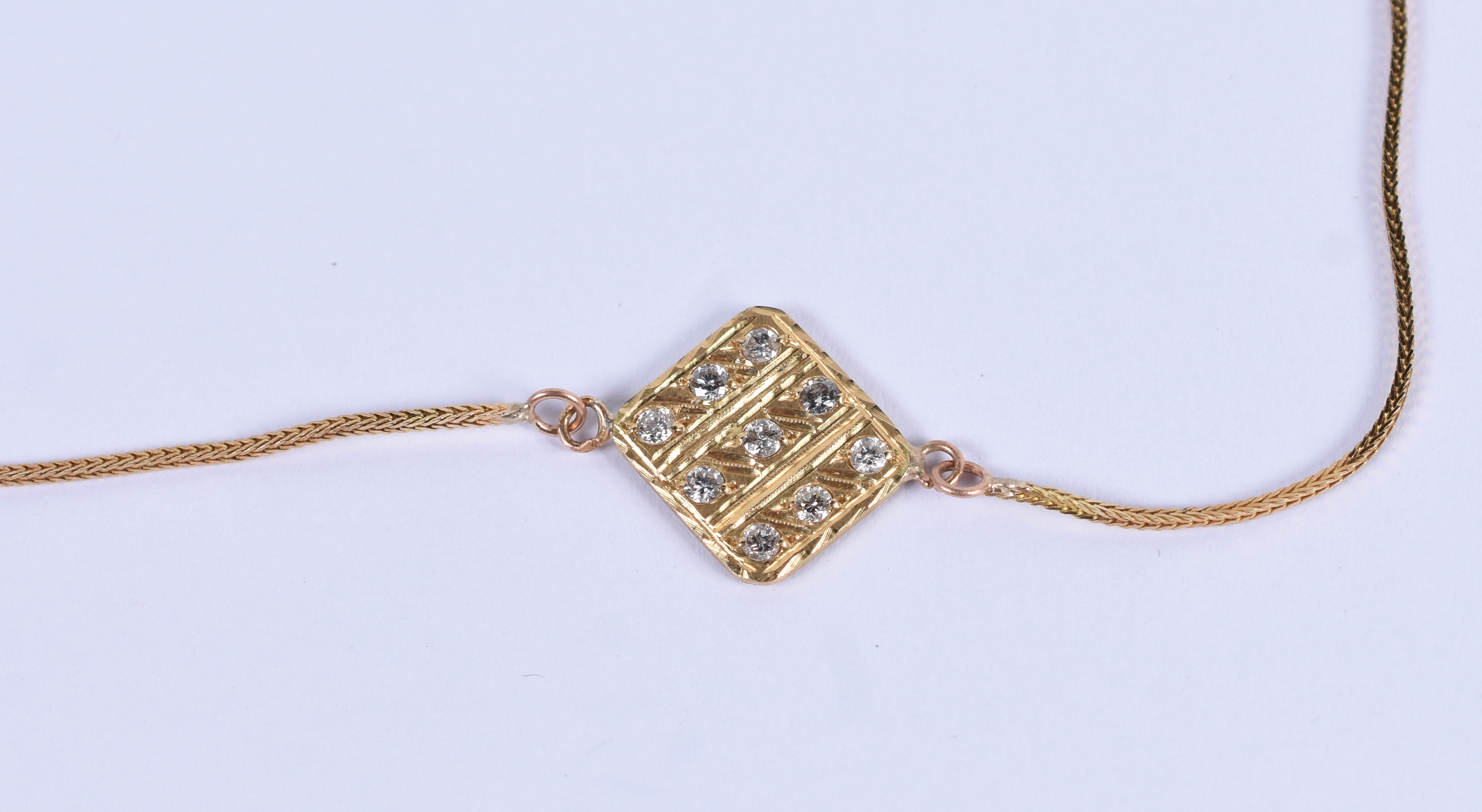 Cordão de ouro 18 k com pingente em forma de placa com... - foto 1 de 4