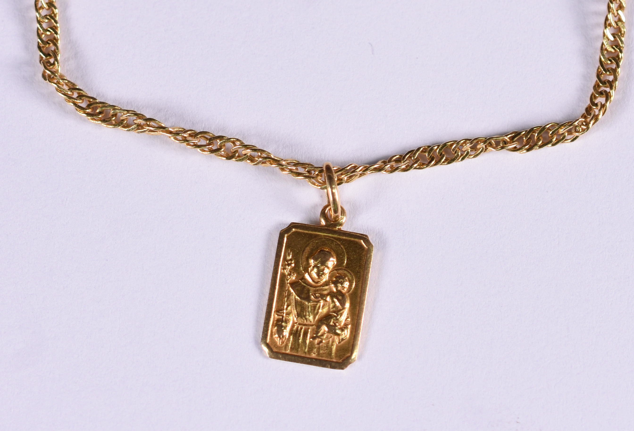 Pulseira de ouro 18 k com medalha de Santo Antônio.(Por questão de... - foto 1 de 4