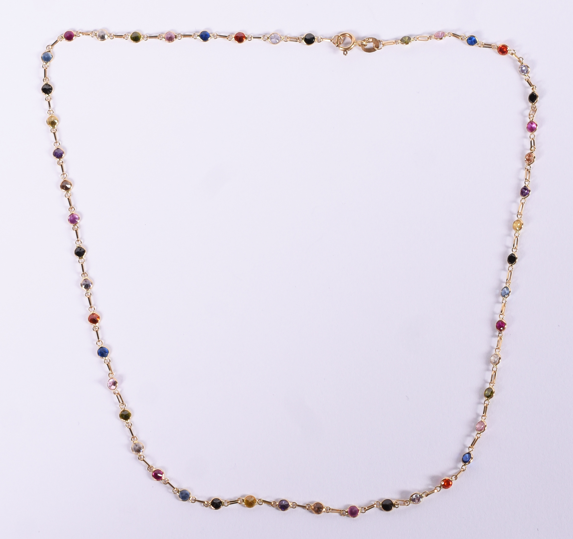 Colar de ouro 18 k com pedras coloridas. Comprimento 40 cm. - foto 2 de 3