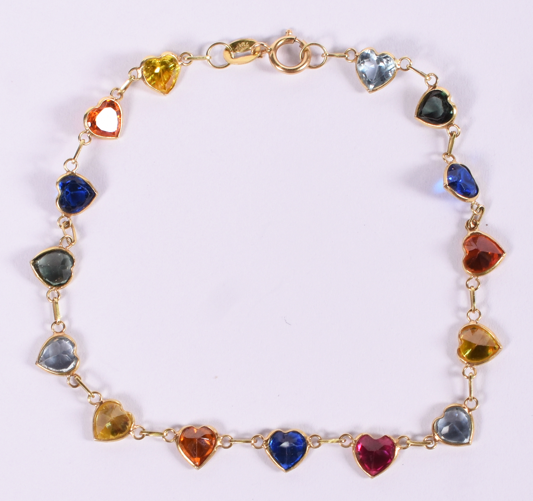 Pulseira de ouro 18 k com pedras coloridas, comprimento 20 cm. - foto 1 de 3