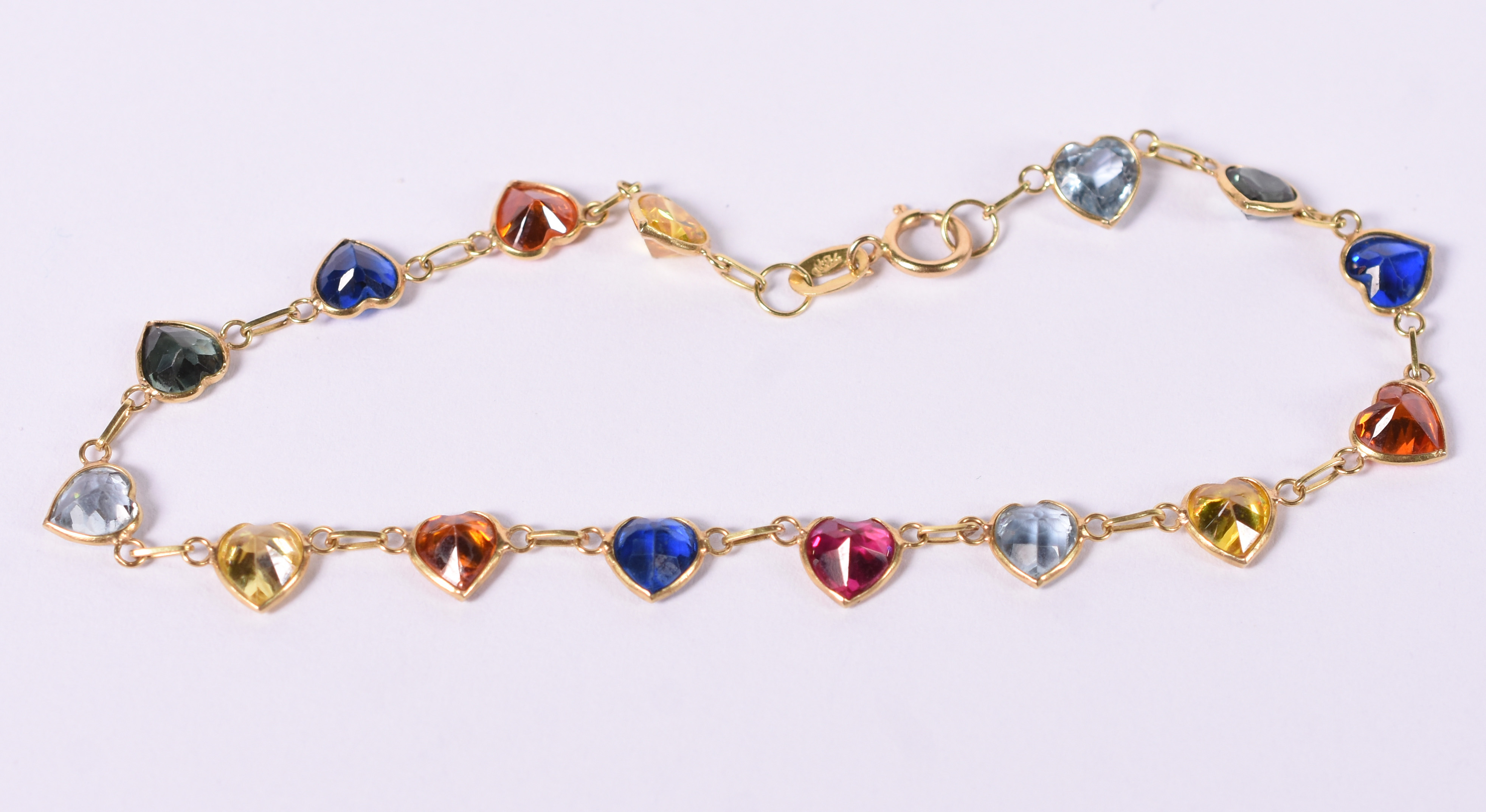 Pulseira de ouro 18 k com pedras coloridas, comprimento 20 cm. - foto 2 de 3