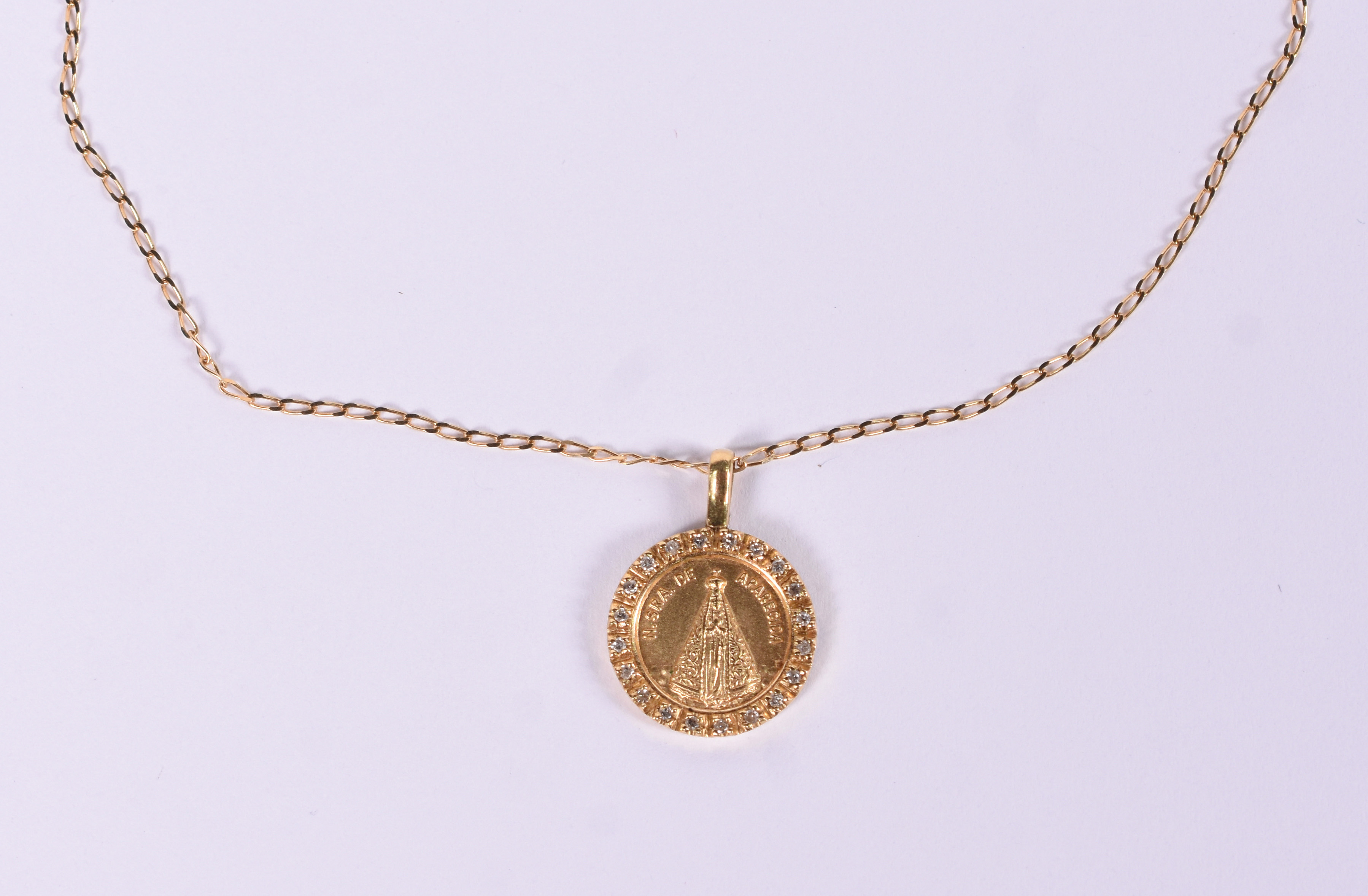 Gargantilha de ouro 18 k com pingente de N.Sra.Aparecida, compr.40 cm. - foto 1 de 5