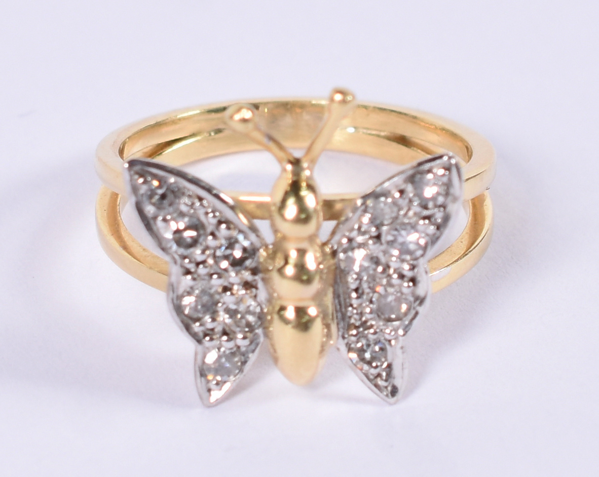 Anel feitio mariposa de ouro 18 k e 12 brilhantes. Aro 16. - foto 1 de 3
