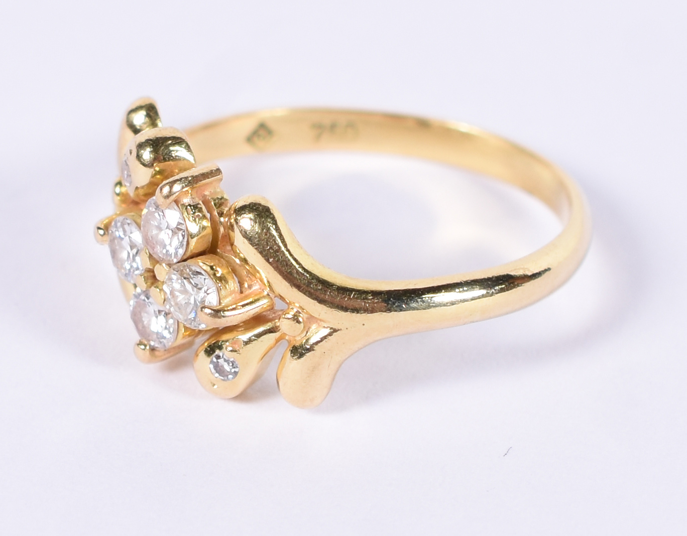 Anel de ouro 18 k com 4 brilhantes com aproximadamente 0,40 cts. Aro... - foto 2 de 4