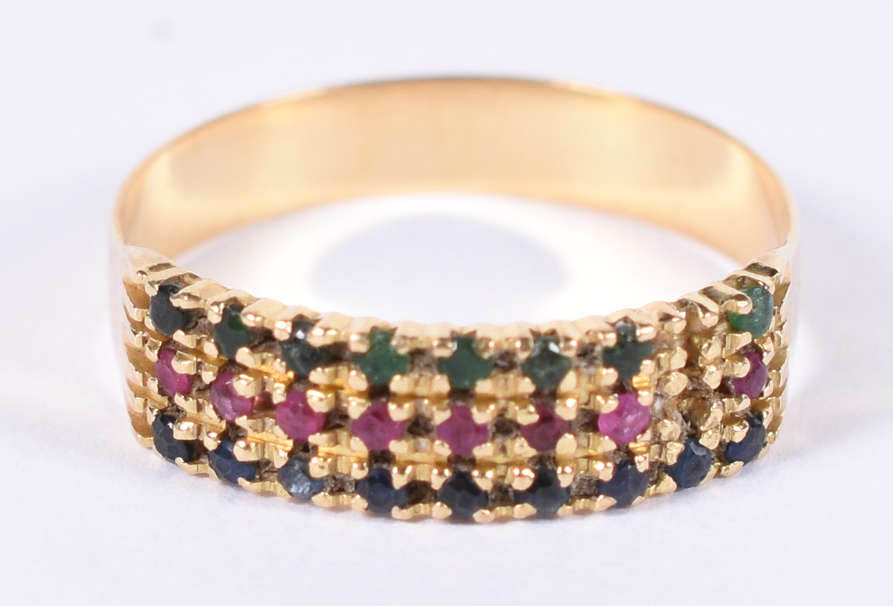 Anel de ouro amarelo 18 k com esmeraldas e rubis. Aro 16. - foto 1 de 4