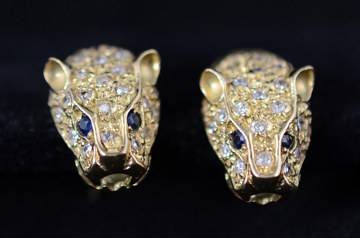 Par de brincos de ouro 18 k modelo pantera, cravejado com 24... - foto 2 de 2