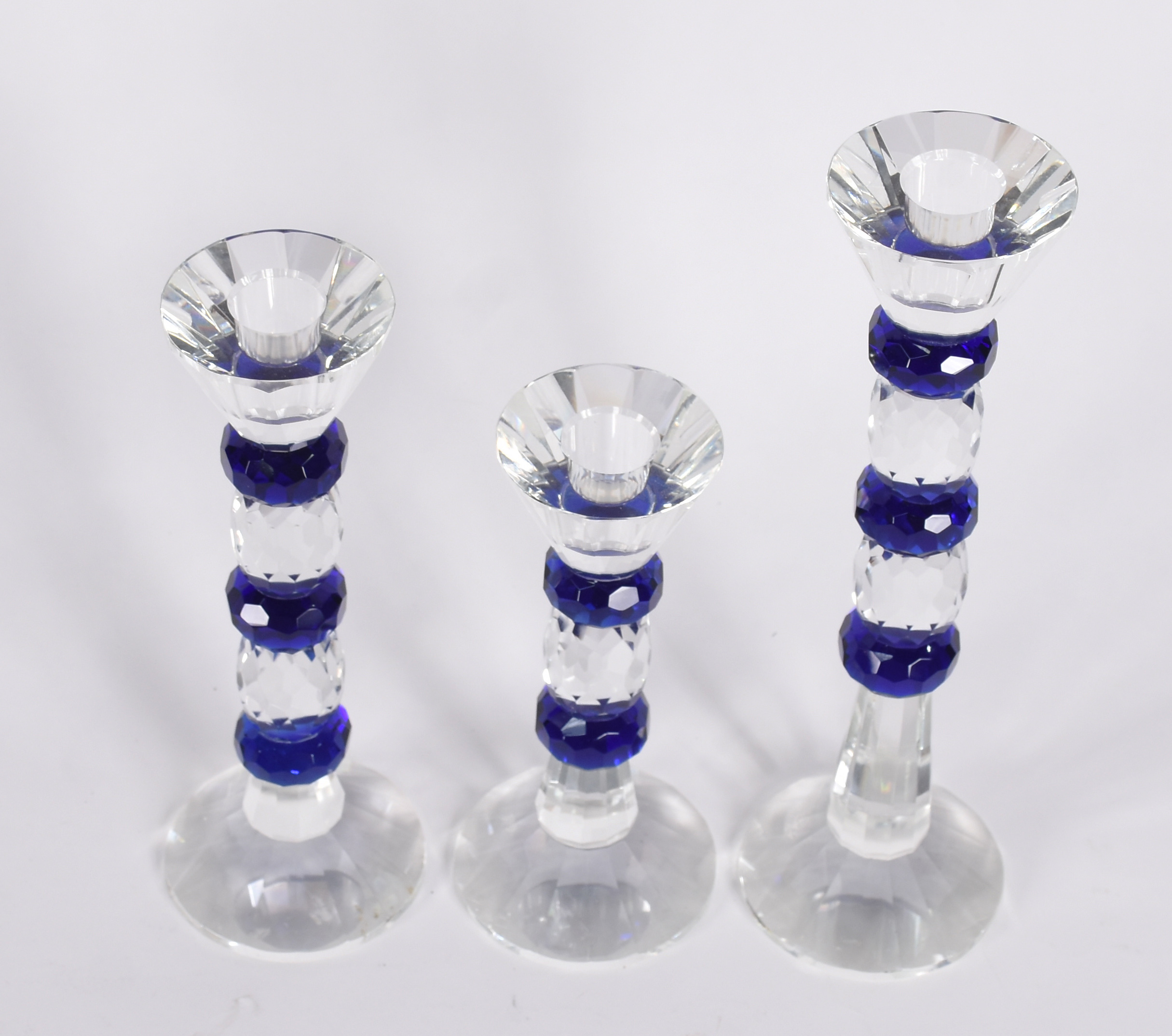 Três castiçais de cristal com detalhes em azul marinho. - foto 2 de 3