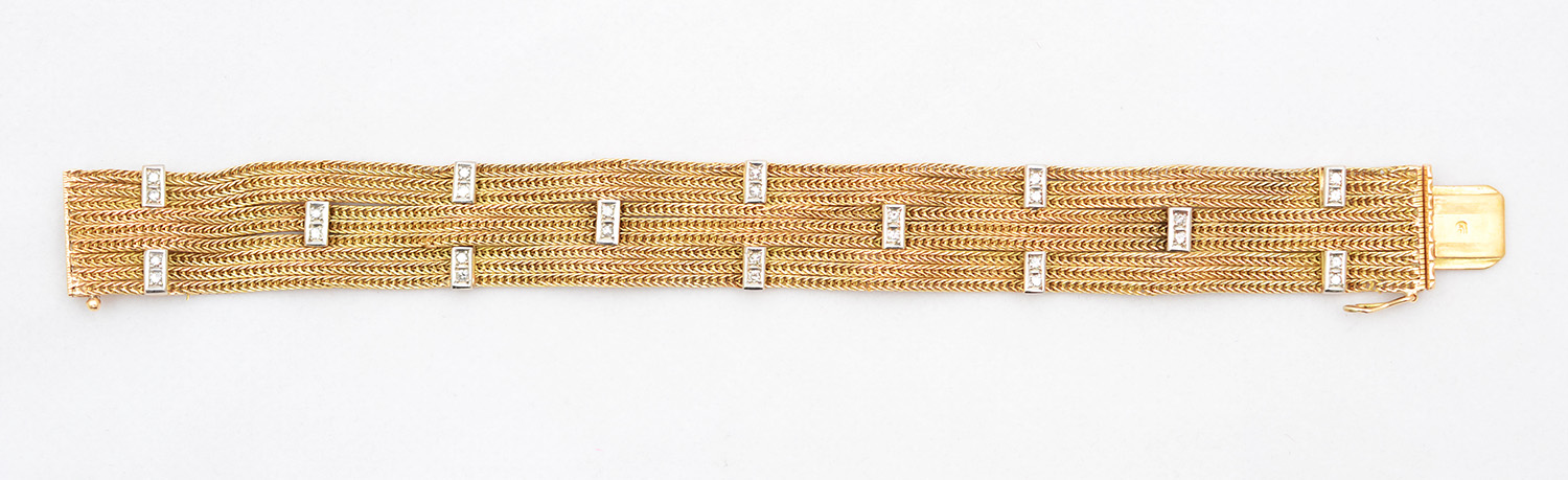 Pulseira de ouro 18 k, contrastado com 0.56 ct de brilhantes. Peso...