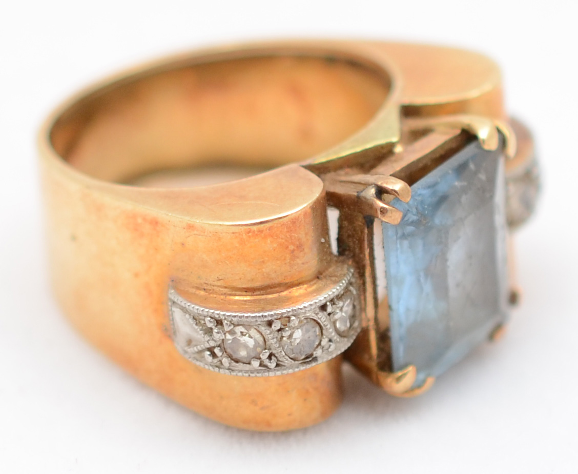 Anel em ouro 18 k, pedra azul e 6 brilhantes com 0.18 ct de... - foto 1 de 2