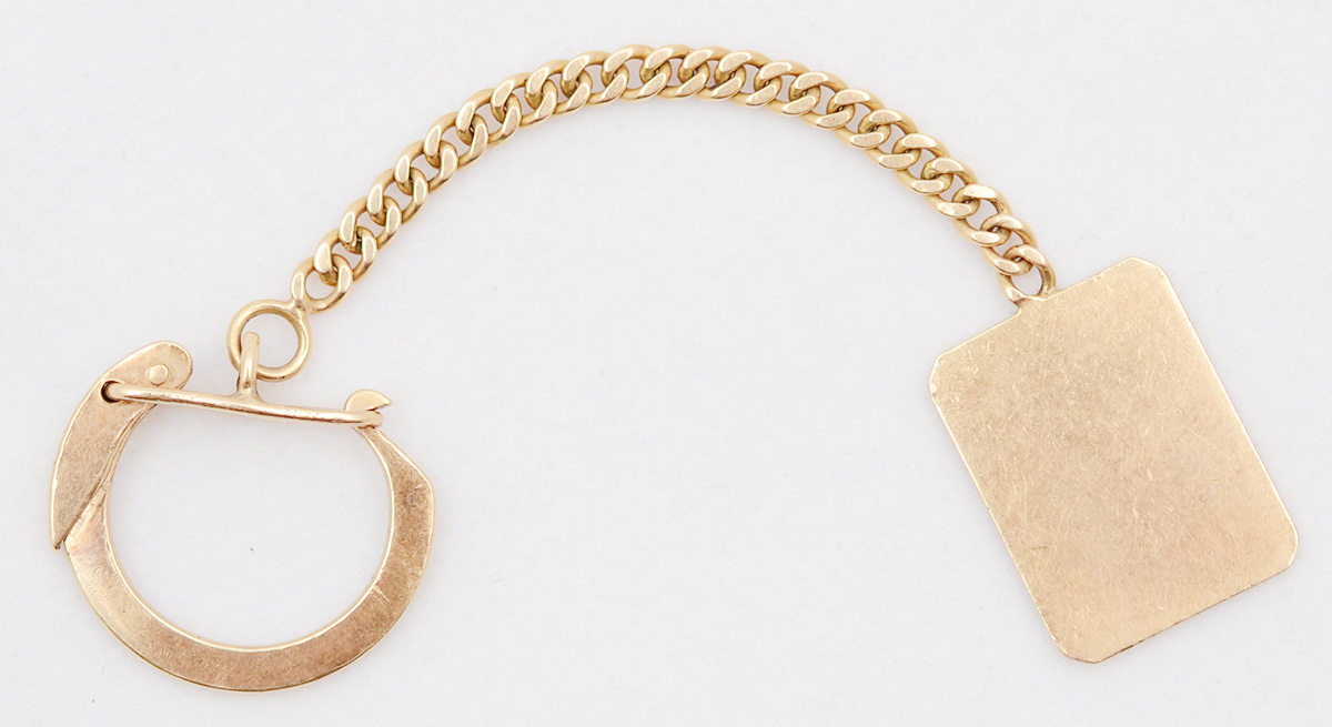 Chaveiro em ouro 18 k. Peso total 10,2 g - Comprimento 10,5 cm.