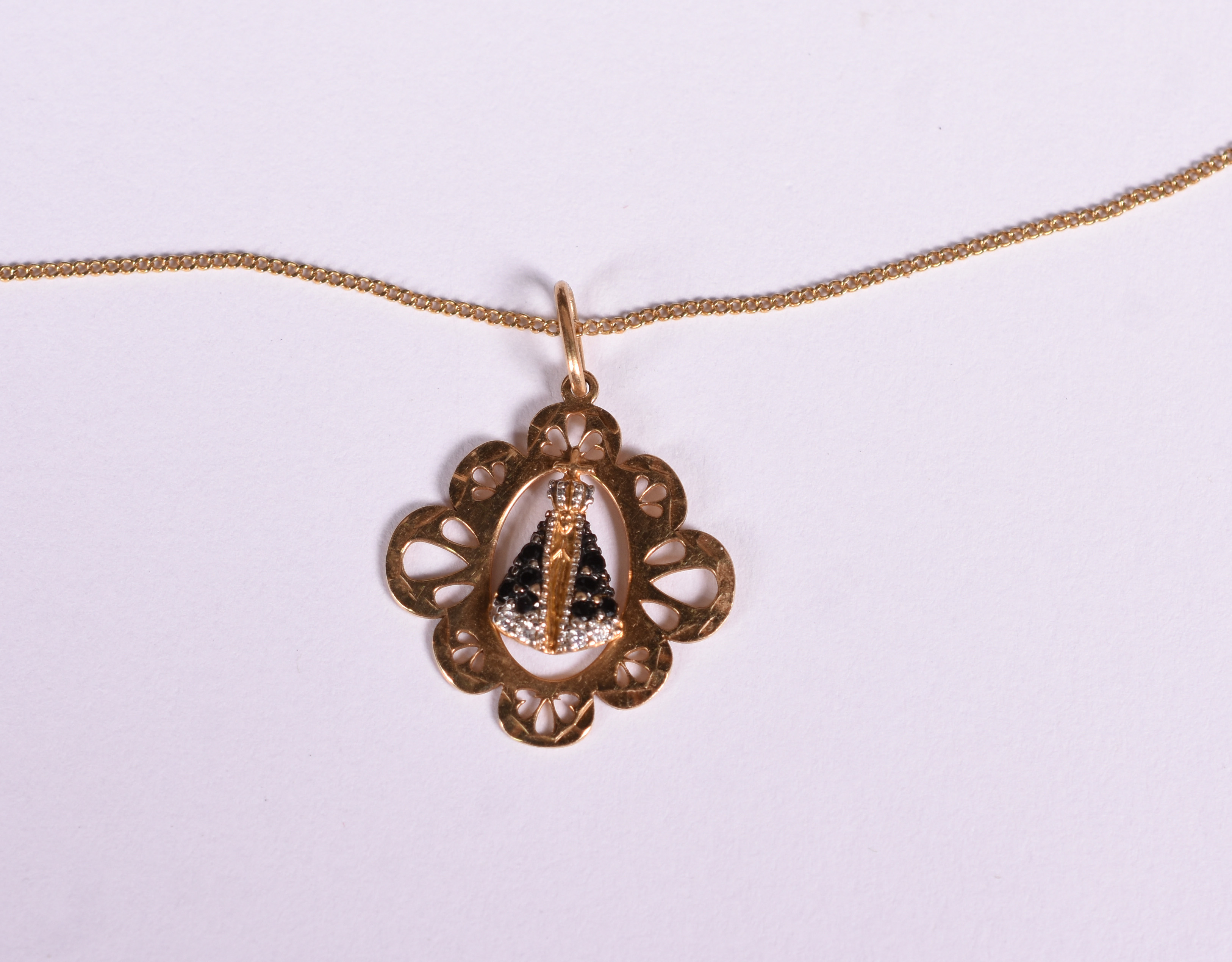 Gargantilha de ouro 18 k com pingente Nossa Senhora Aparecida. 60 cm... - foto 1 de 4