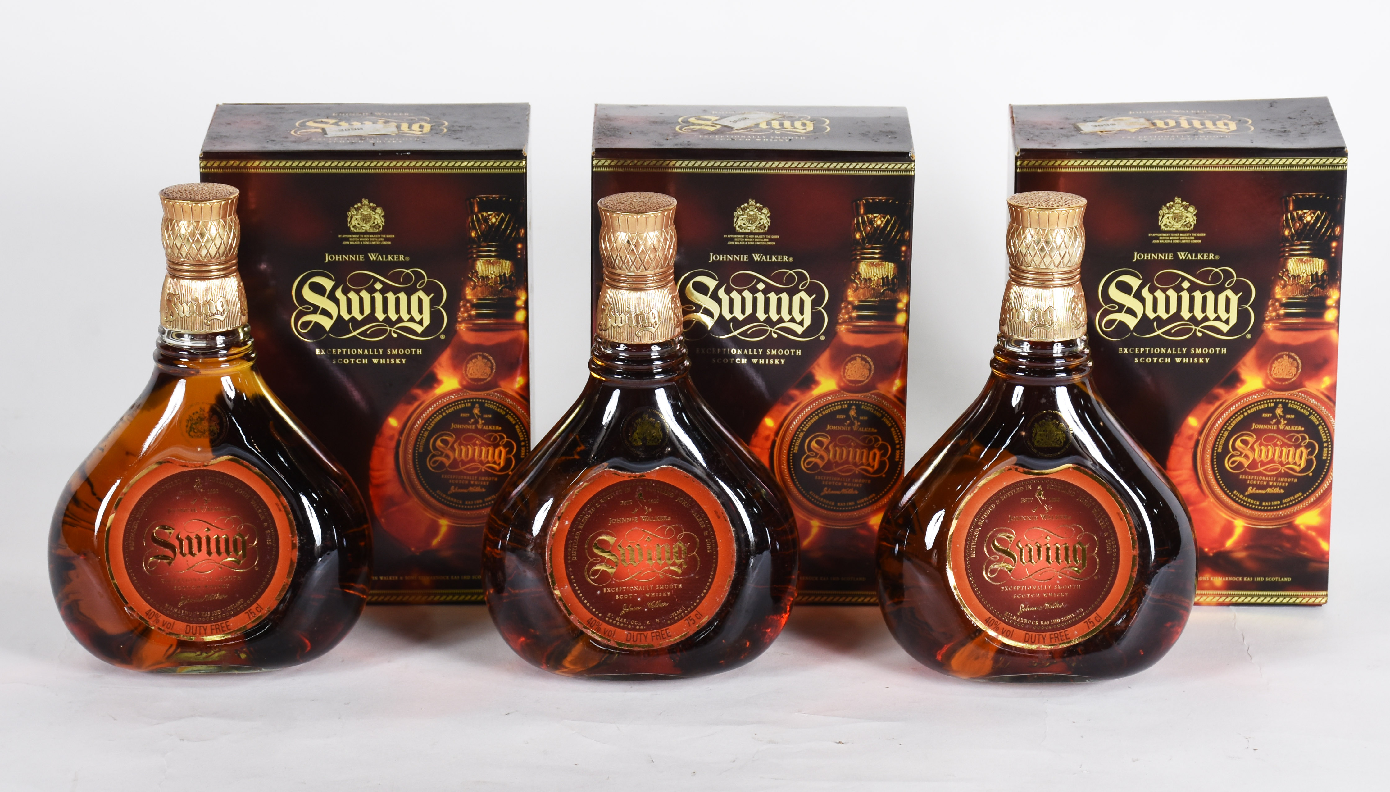 Tres garrafas de Whisky SWING, 750 ml, na embalagem. - foto 1 de 4