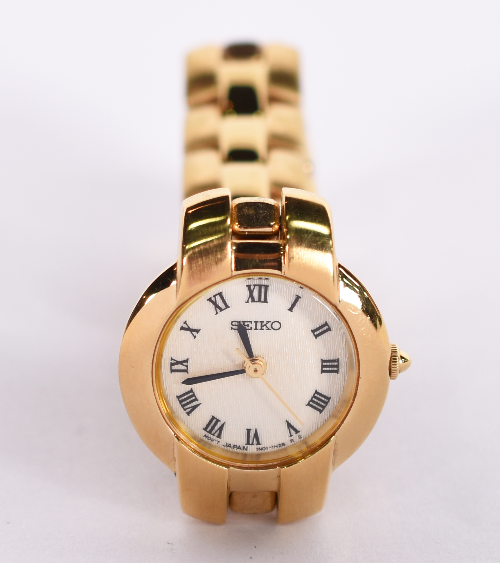 Relógio Seiko feminino, dourado, mostrador em algarismos romanos... - foto 1 de 5