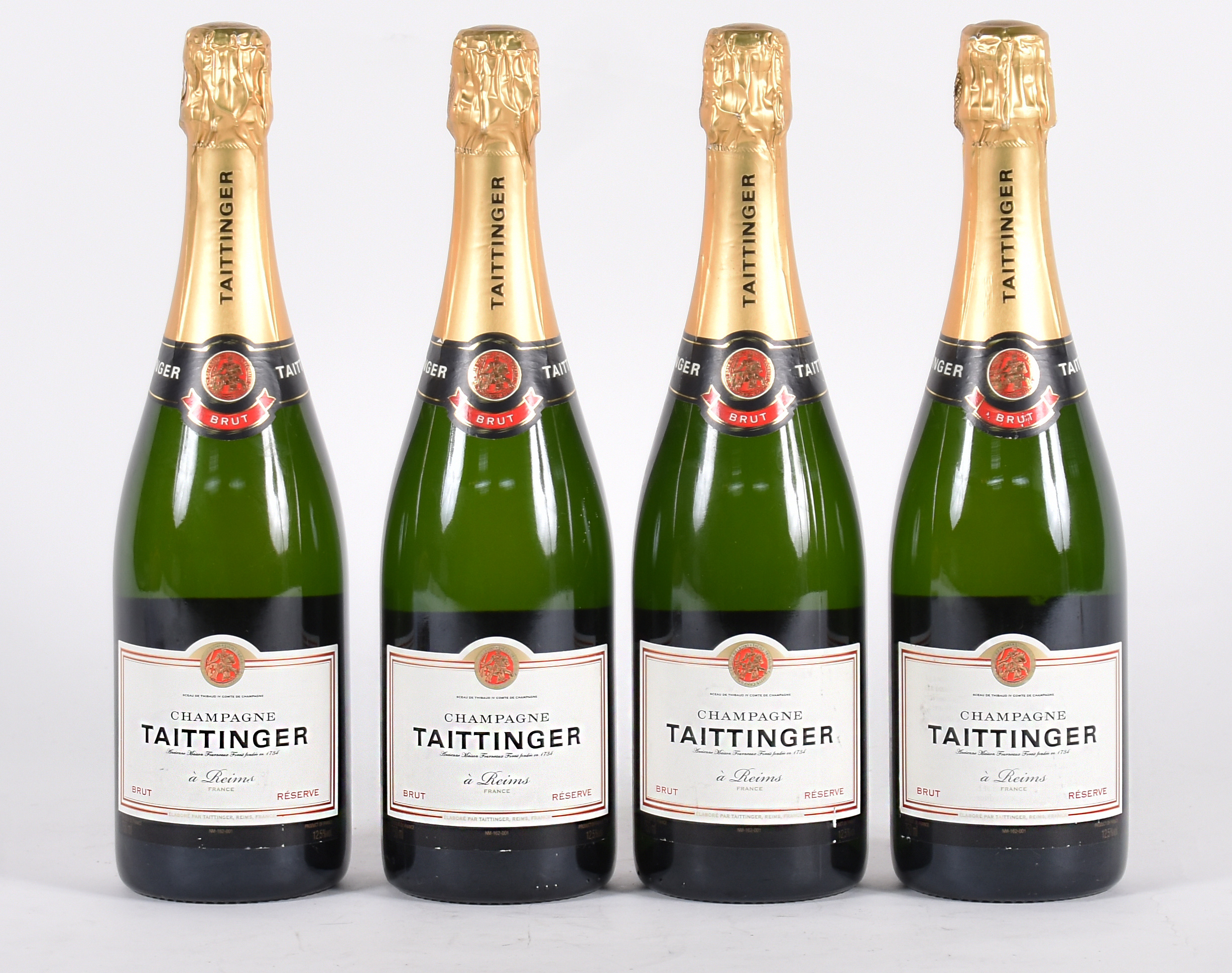 Quatro garrafas de Champagne Taittinger Brut Reserve, 750 ml. cada. - foto 1 de 2
