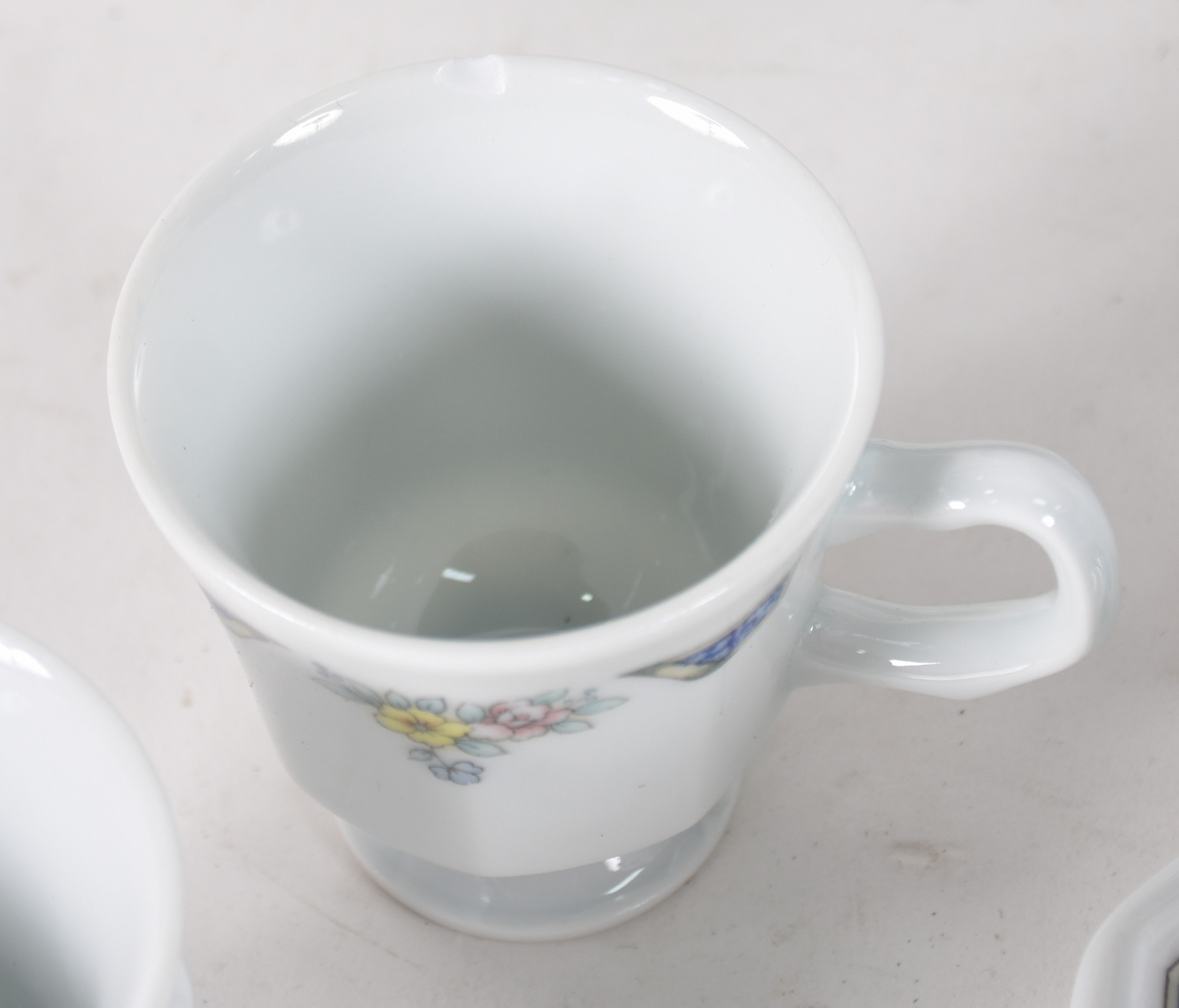 Serviço de porcelana Schmidt composto de 10 pratos rasos, 10 pratos... - foto 5 de 5