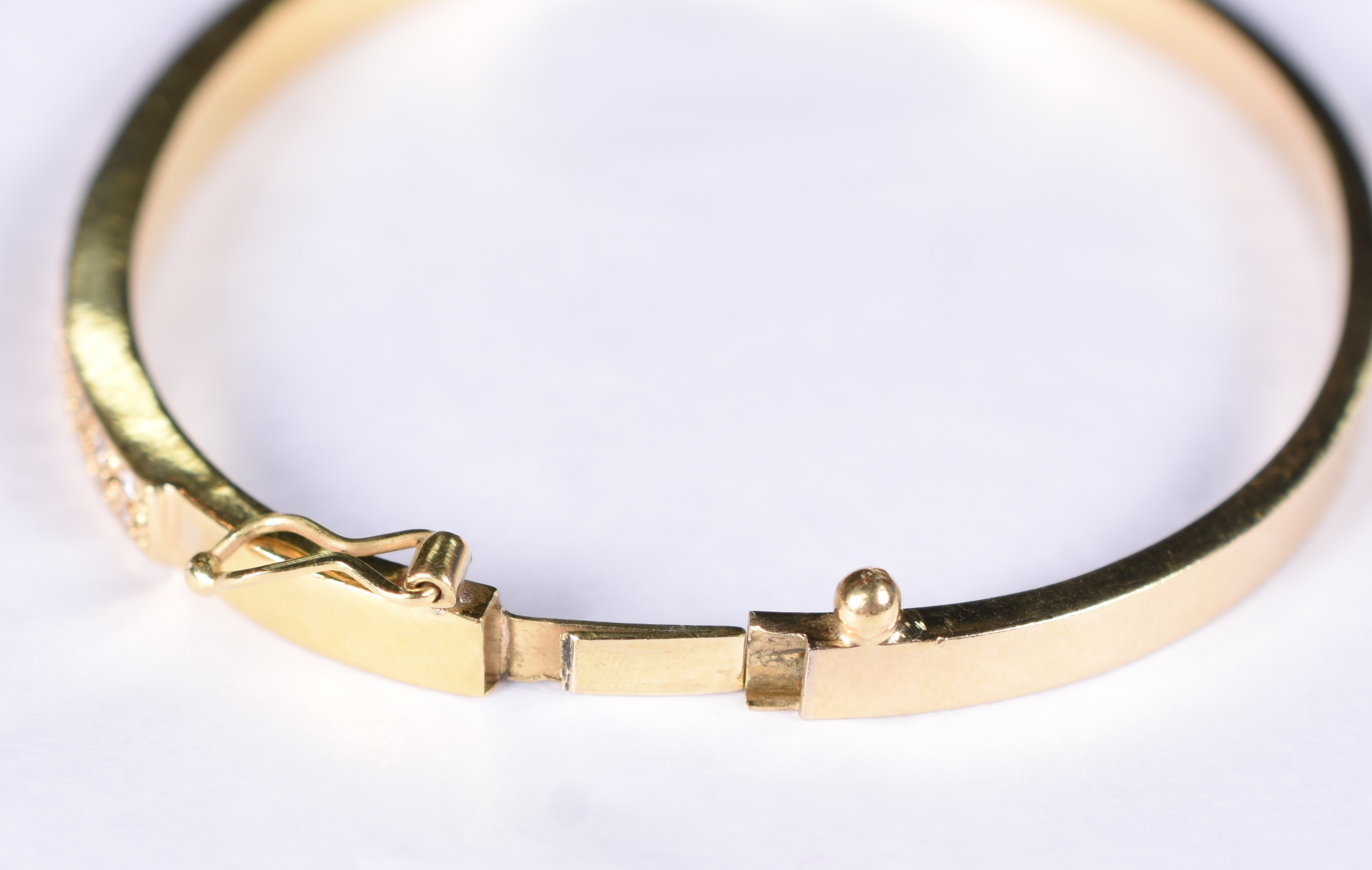 Pulseira de ouro amarelo 18 k tipo escrava com 20 brilhantes. - foto 3 de 3