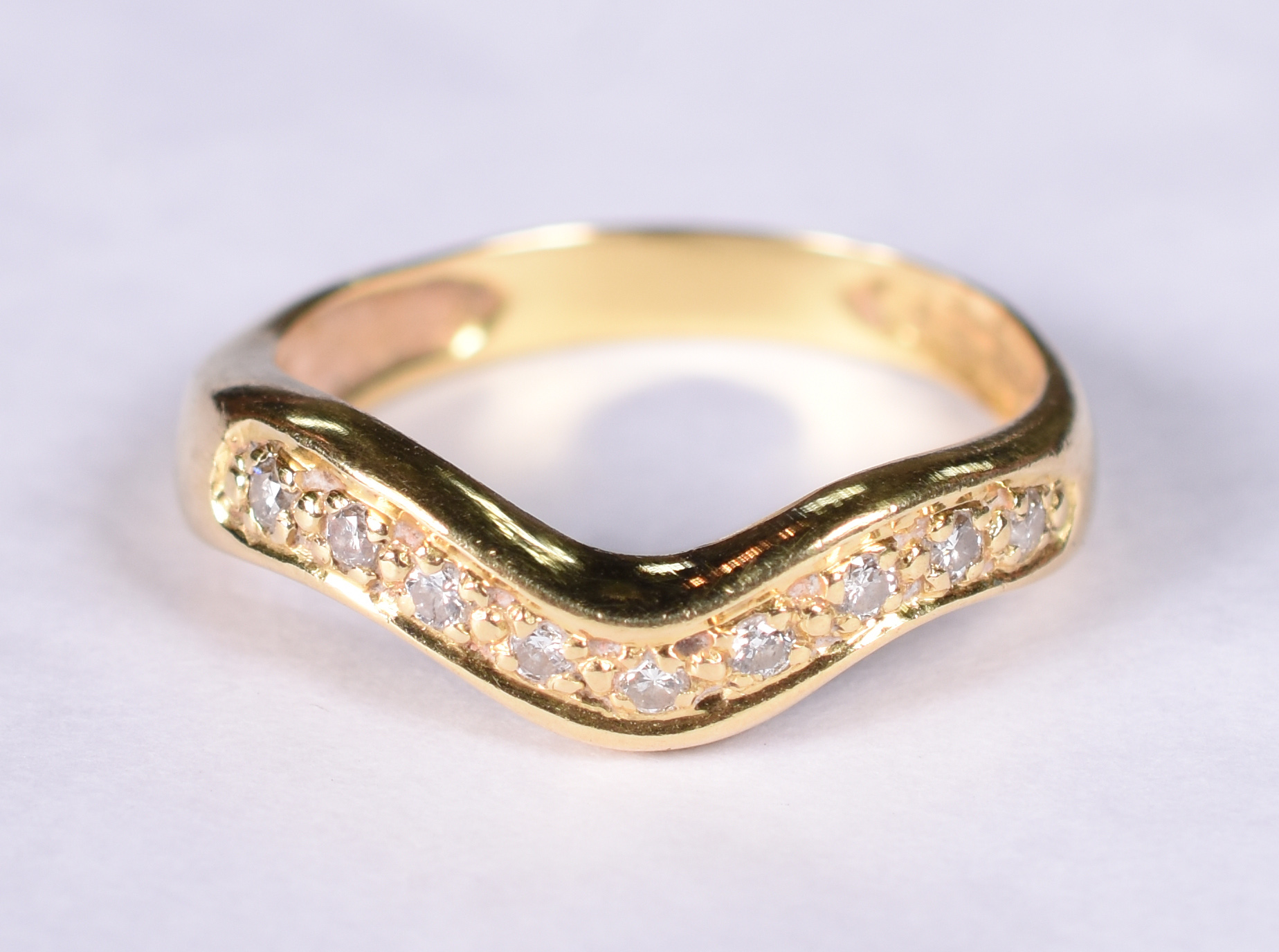 Anel de ouro amarelo 18 k com 10 brilhantes. Aro 16. - foto 1 de 3