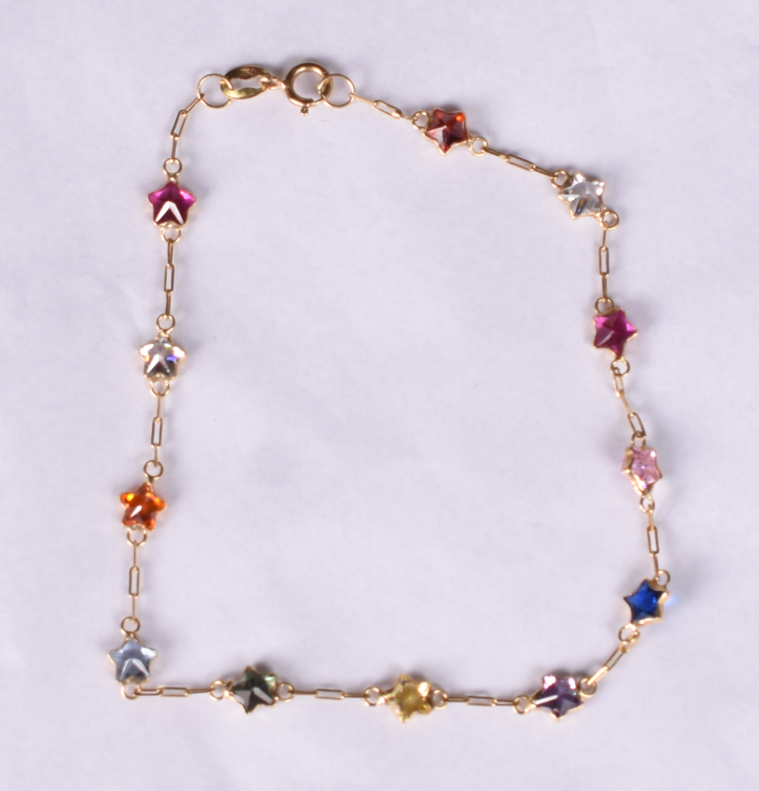 Pulseira de ouro amarelo 18 k com pedras coloridas. - foto 2 de 3